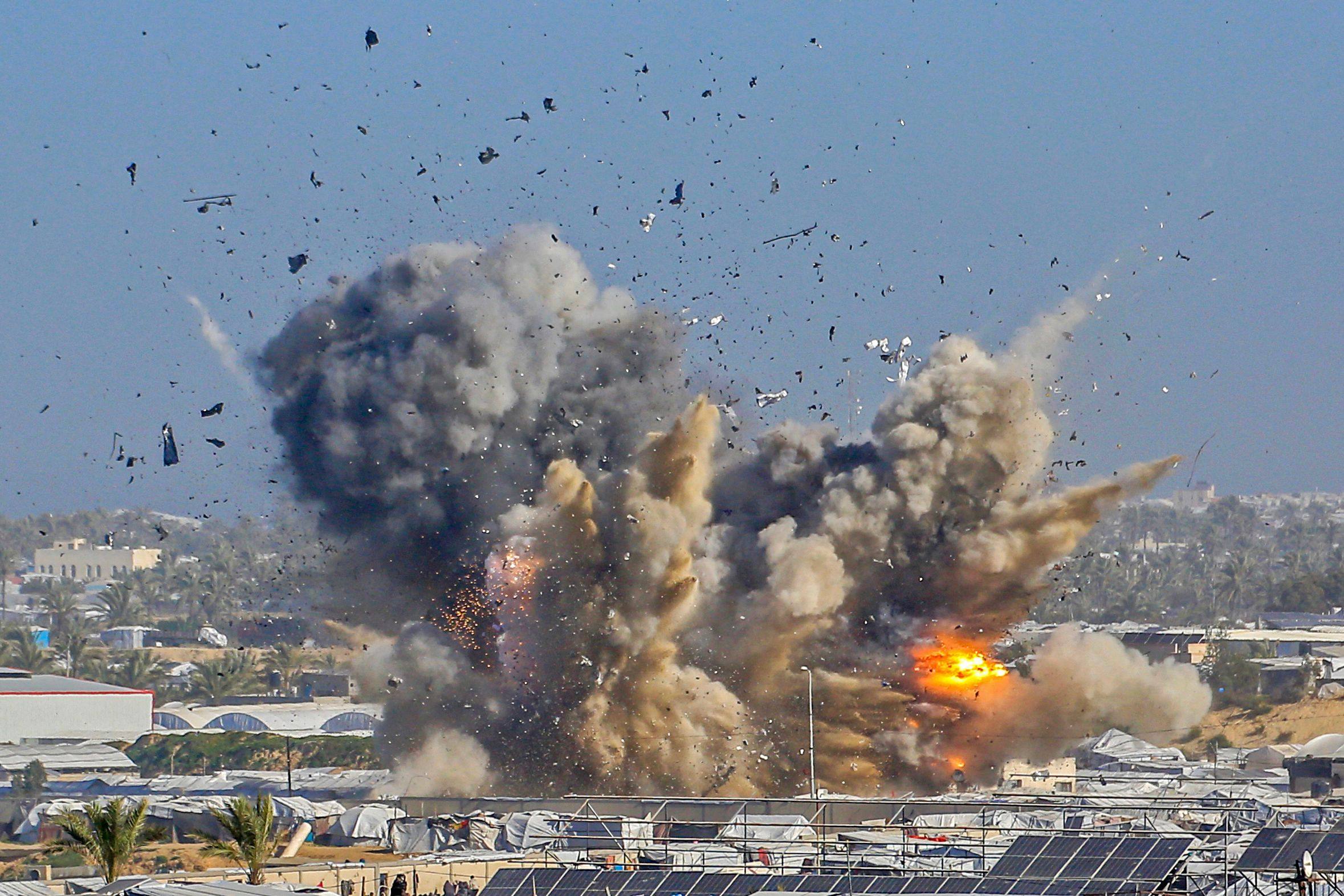 Smoke rises from the Gath shelter, housing displaced Palestinians, after an Israeli strike in the west of Khan Younis on Saturday. Photo: AFP