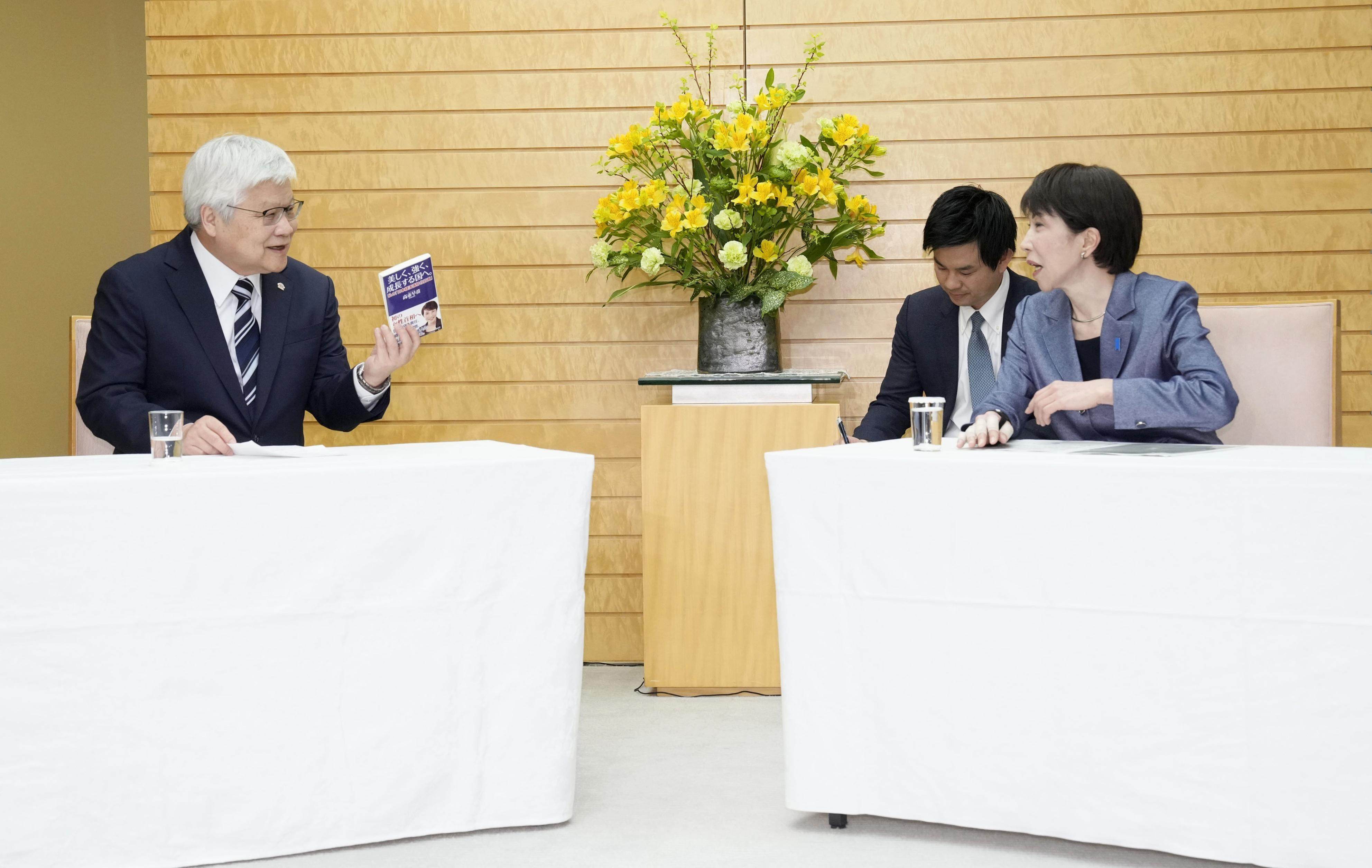 TSMC CEO CC Wei (left) meets Japanese Prime Minister Sanae Takaichi in Tokyo on Thursday. Photo: Kyodo
