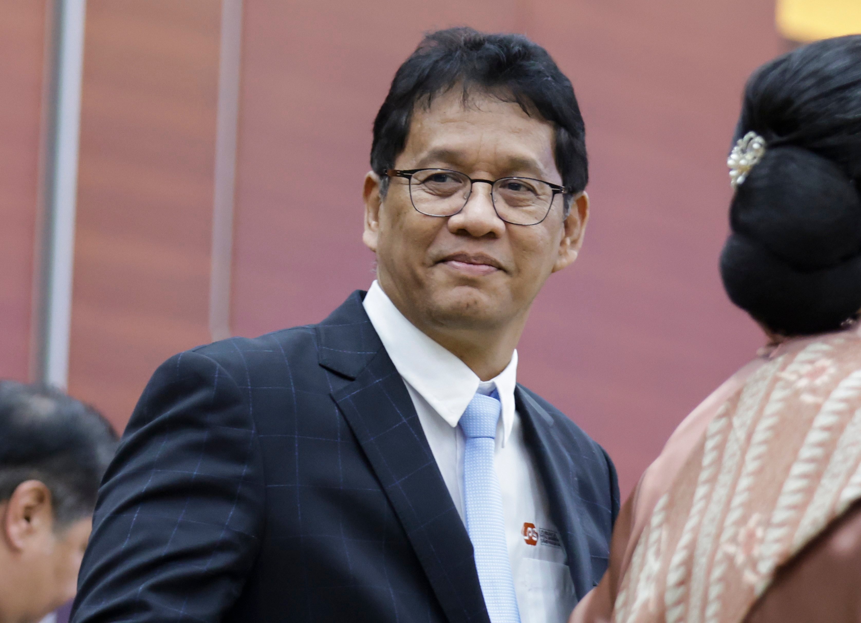 Indonesian Finance Minister Purbaya Yudhi Sadewa smiles to journalists during the handover ceremony in Jakarta on September 9, 2025. Photo: EPA