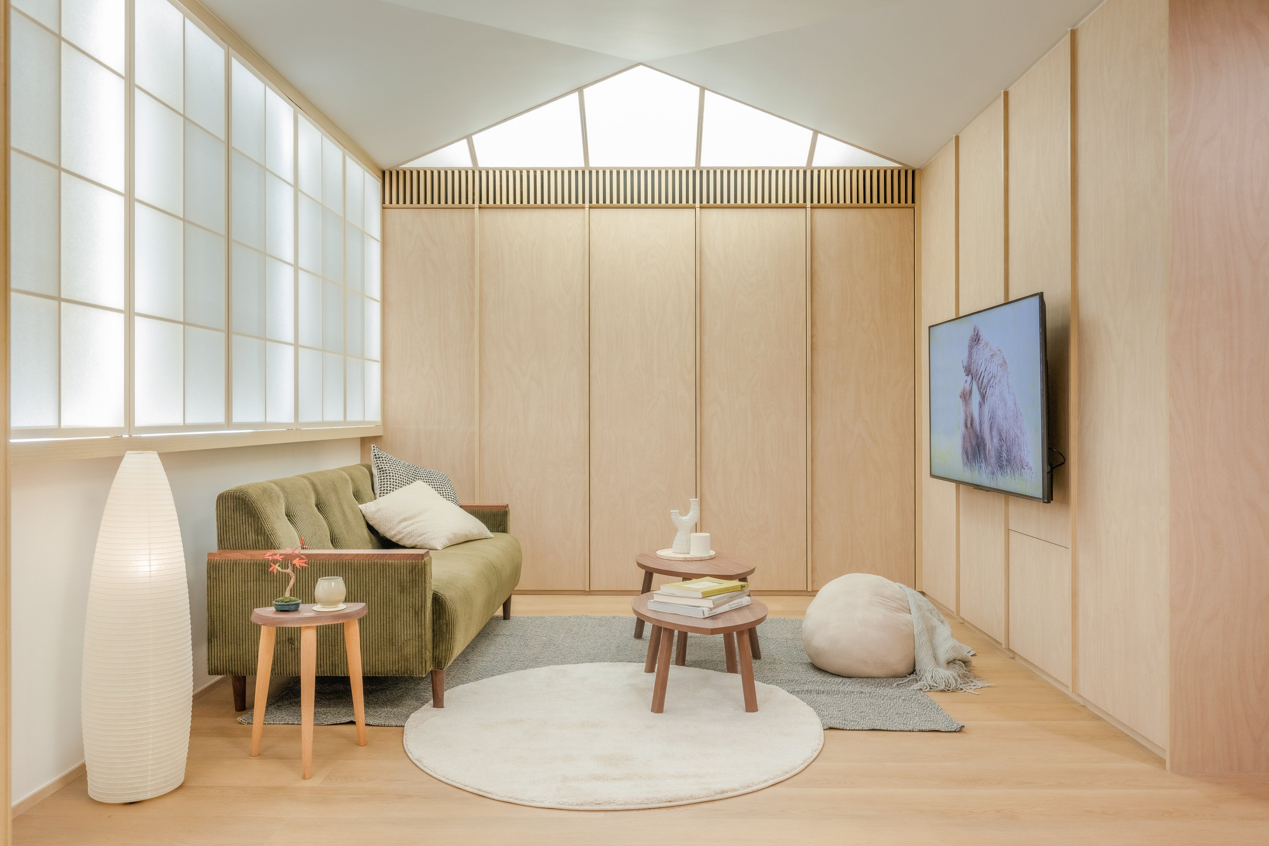 Living area of the flat in Tsim Sha Tsui designed by GAAN. Photo: Eugene Chan