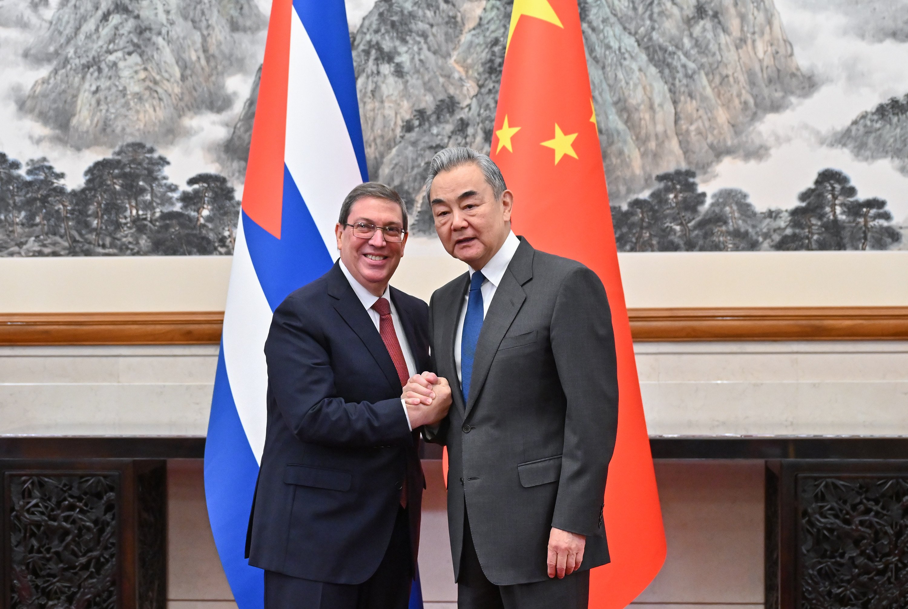 Cuban Foreign Minister Bruno Rodriguez Parrilla (left) and Chinese Foreign Minister Wang Yi reaffirm their countries’ ties in Beijing on Thursday. Photo: Xinhua