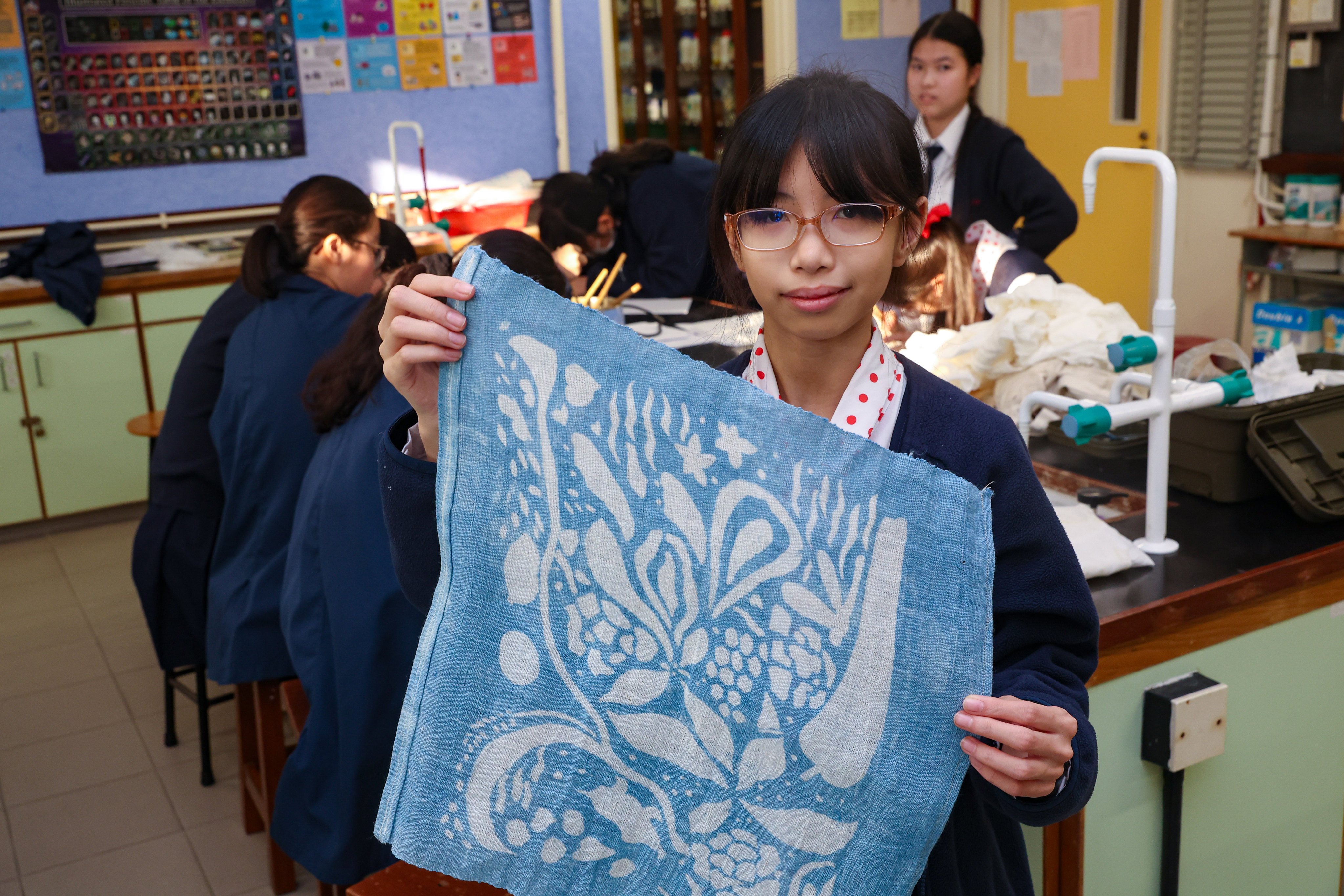 Students at Tak Oi Secondary School dye fabric using the Chinese indigo they grow and ferment. Photo: Edmond So