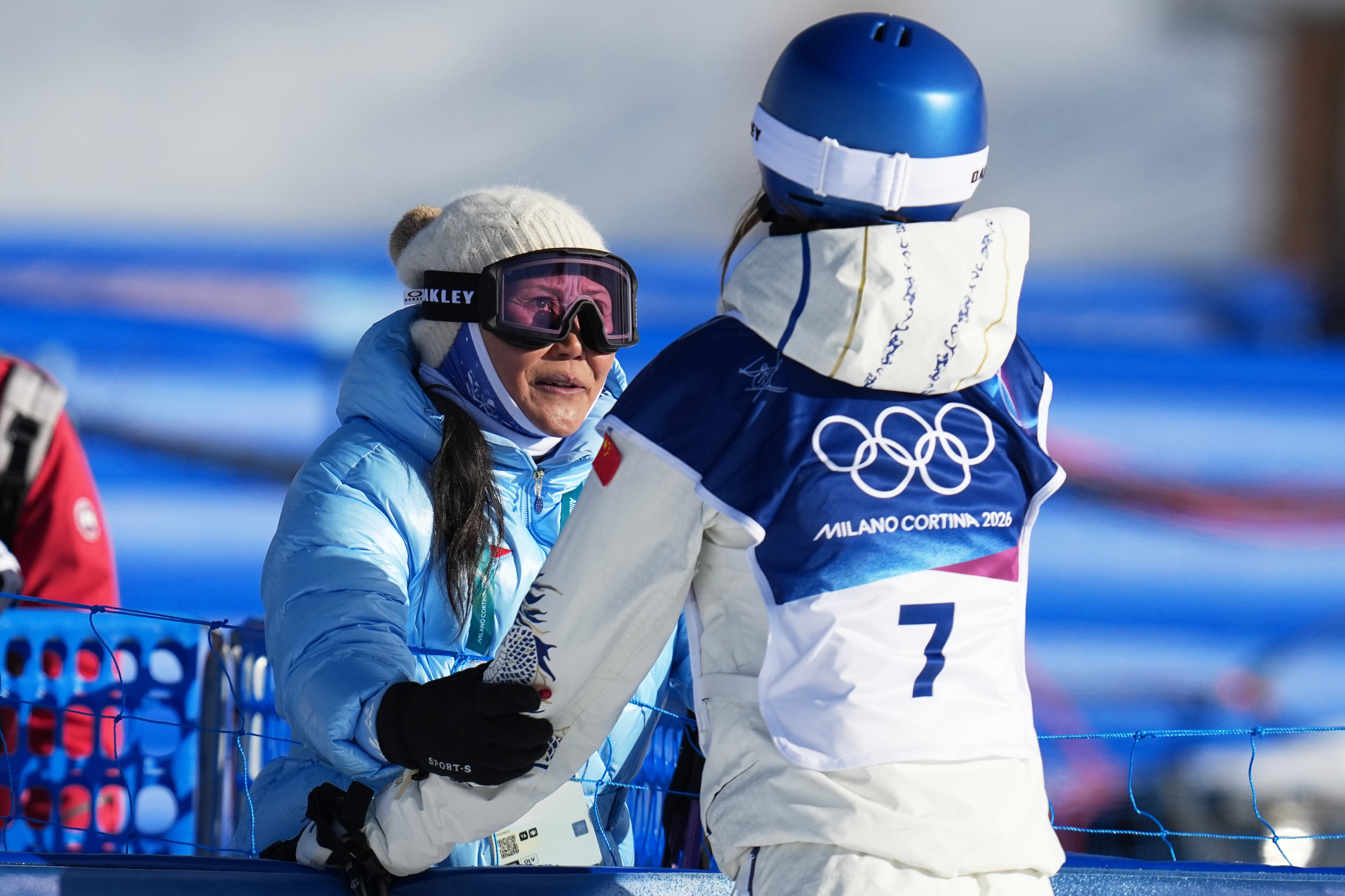 China’s Eileen Gu (right) is encouraged by her mother, Yan Gu, after falling during the women’s freestyle skiing slopestyle qualifications at the Winter Olympics  in Livigno, Italy on Saturday. Photo: AP