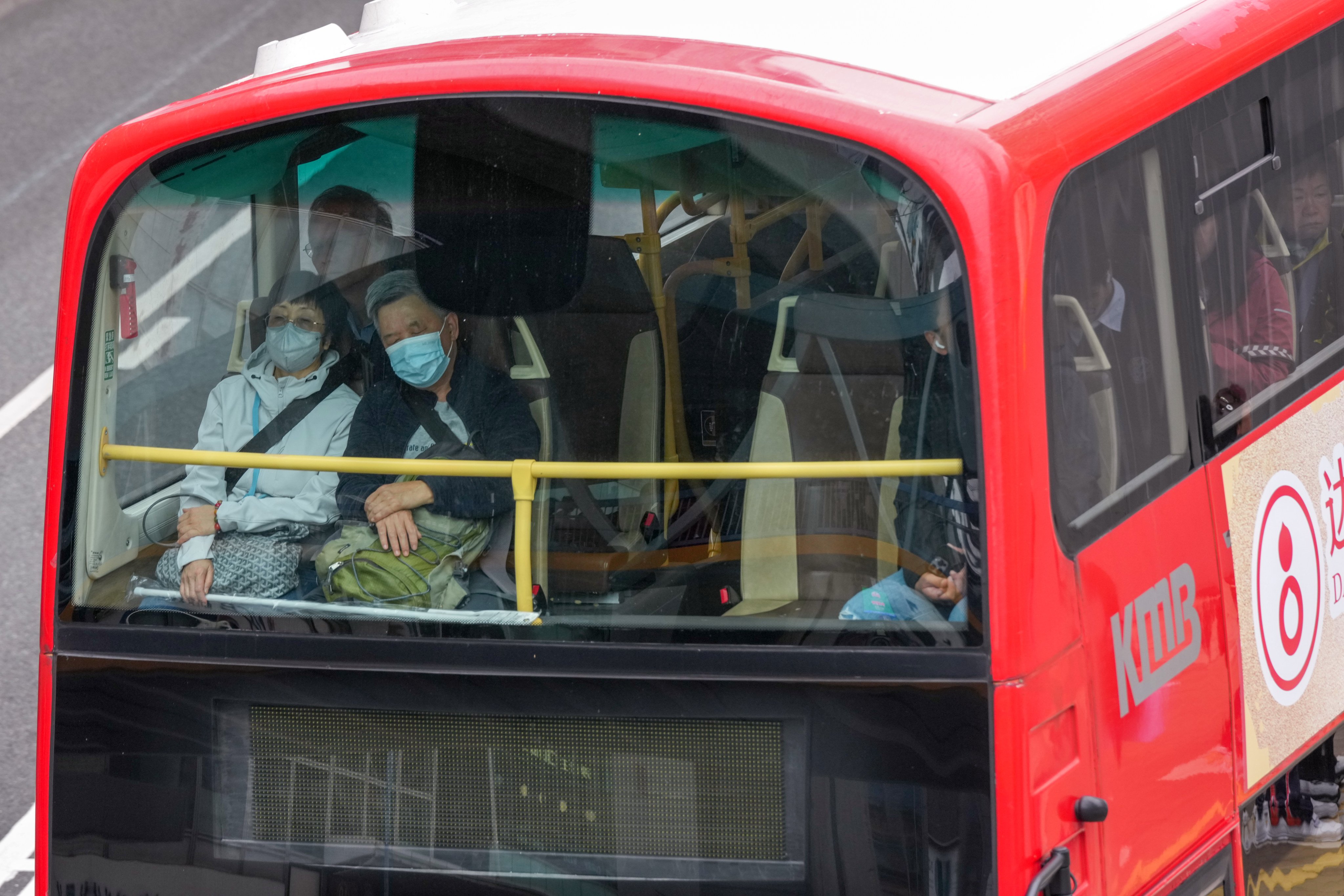 People wear seat belts on a double-decker bus in Kwun Tong on January 30. Photo: Jelly Tse