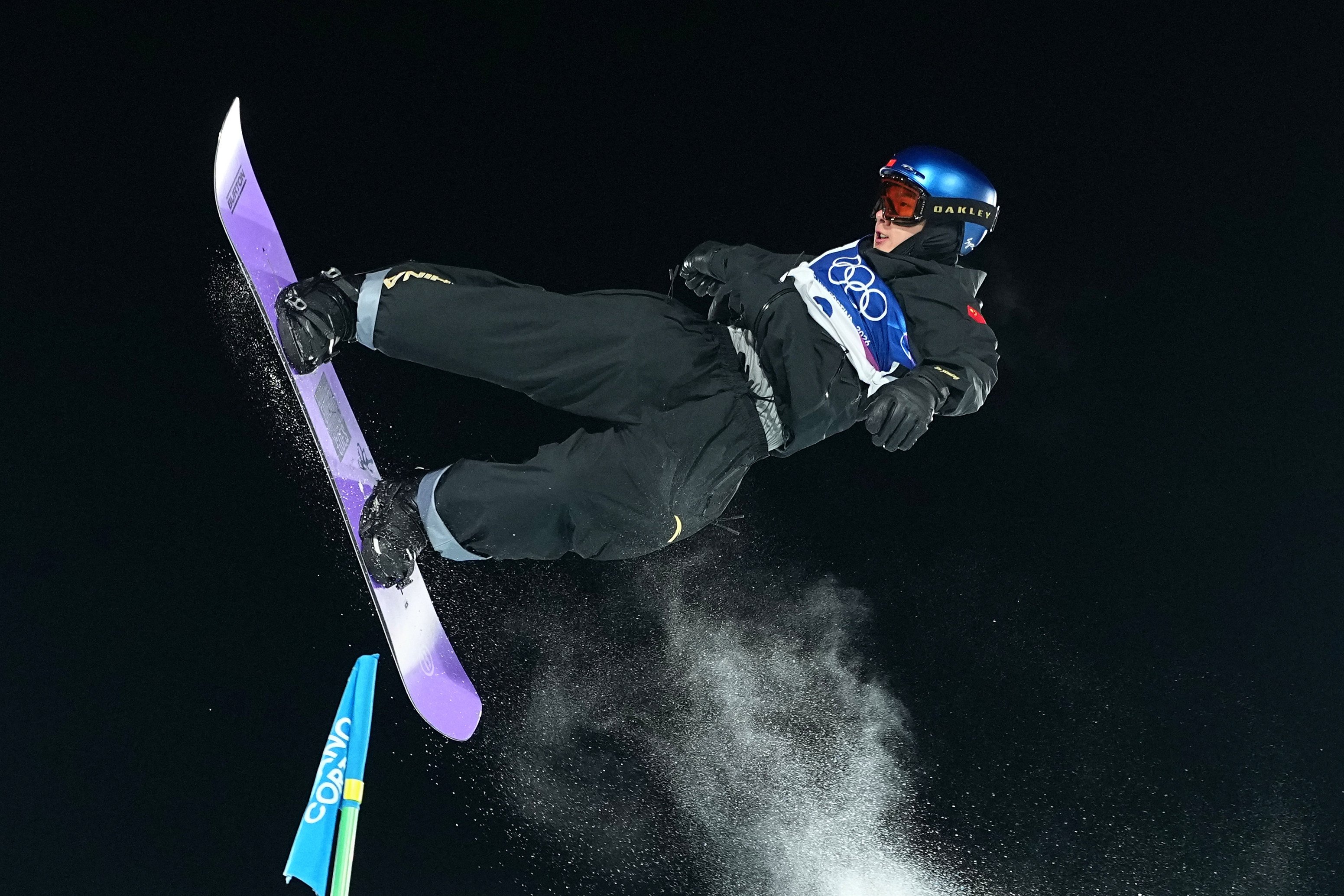 China’s Su Yiming competes during the men’s snowboarding big air finals at the 2026 Winter Olympics. Photo: AP