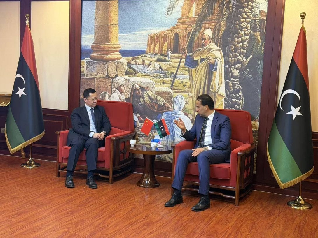 China’s new ambassador to Libya Ma Xueliang (left) meets Libyan charge d’affaires Khaled al-Sayeh in Beijing on January 27. Photo: Libyan News Agency