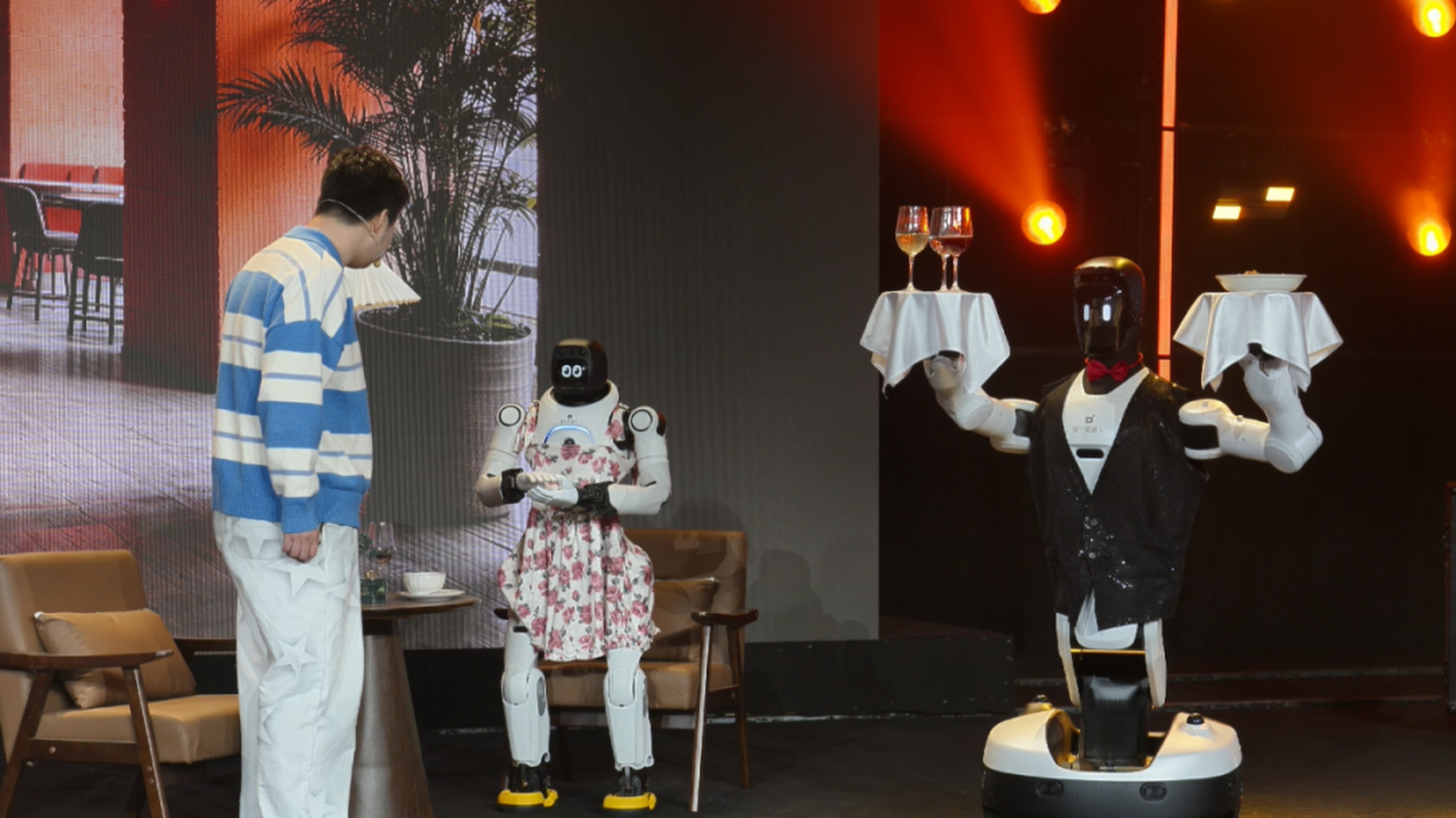 What the butler saw ... costumed robots perform a skit. Photo: Handout