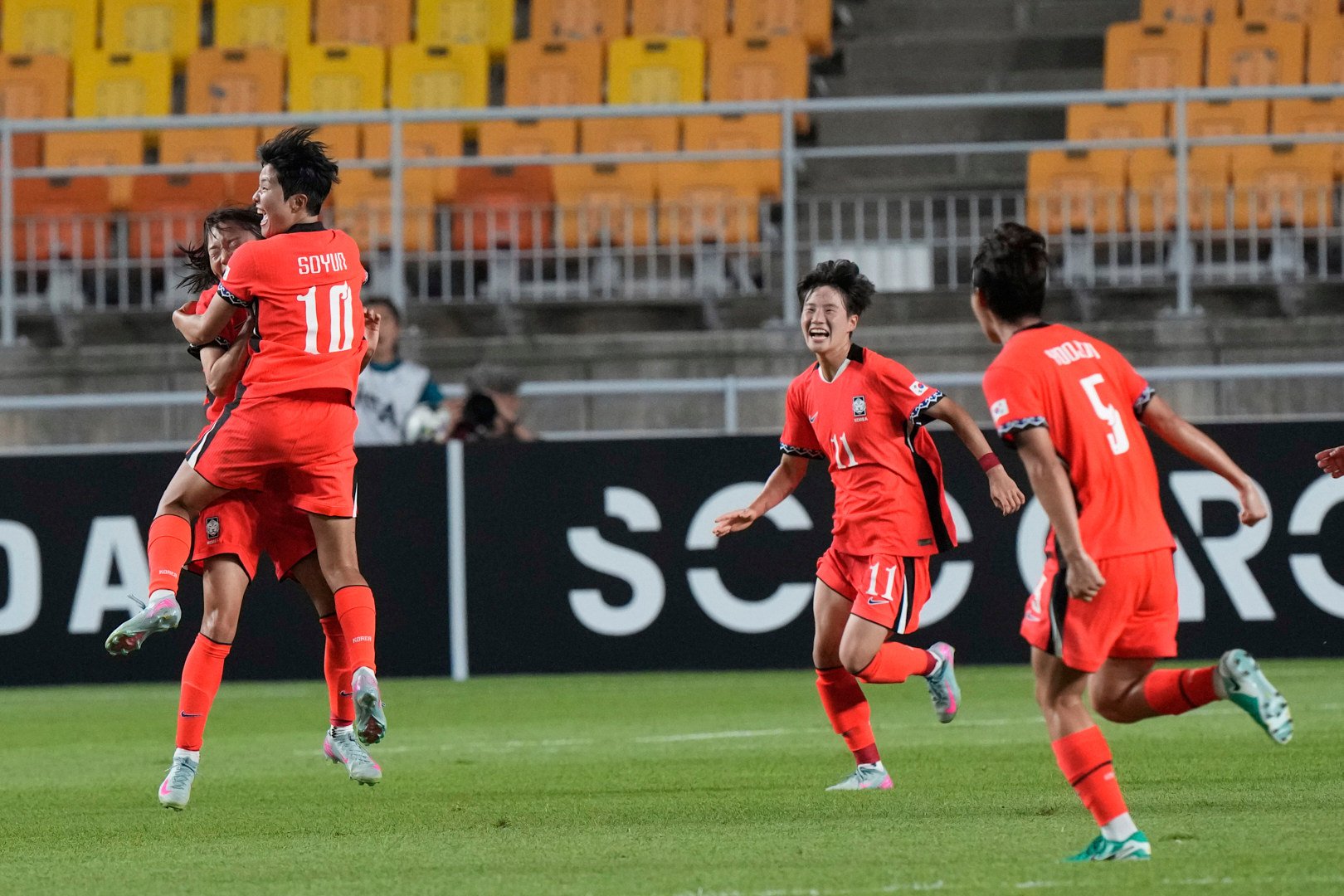 South Korea’s Ji So-yun (second from left) celebrates with her teammates after scoring against China in the E-1 Football Championship in Suwon last July. Photo: AP