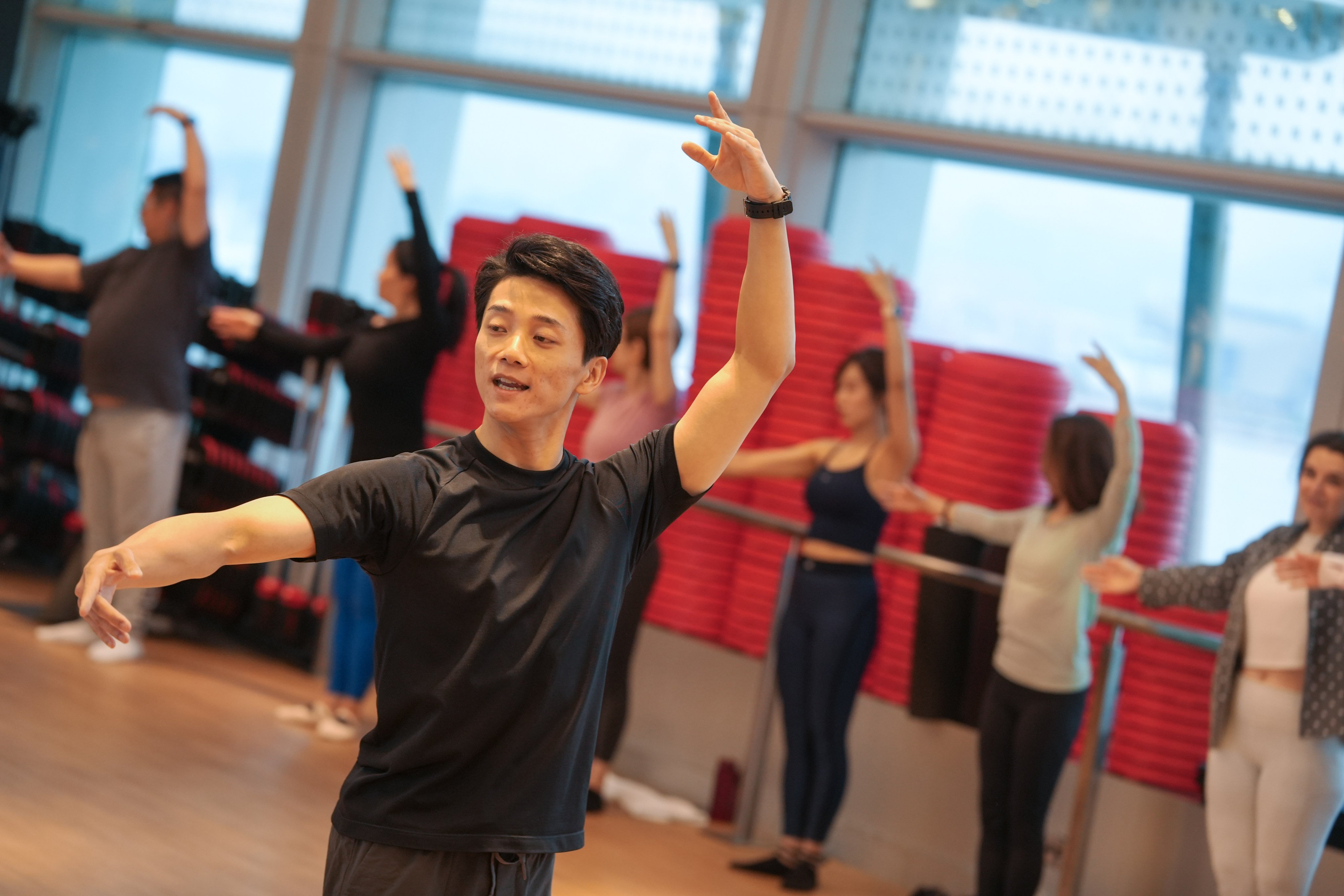 People take part in an introductory workshop led by Shen Jie at a Pure Fitness gym in Central. Hong Kong Ballet and Pure Fitness have united to demystify ballet, offering workshops that blend dance and fitness. Photo: Sun Yeung