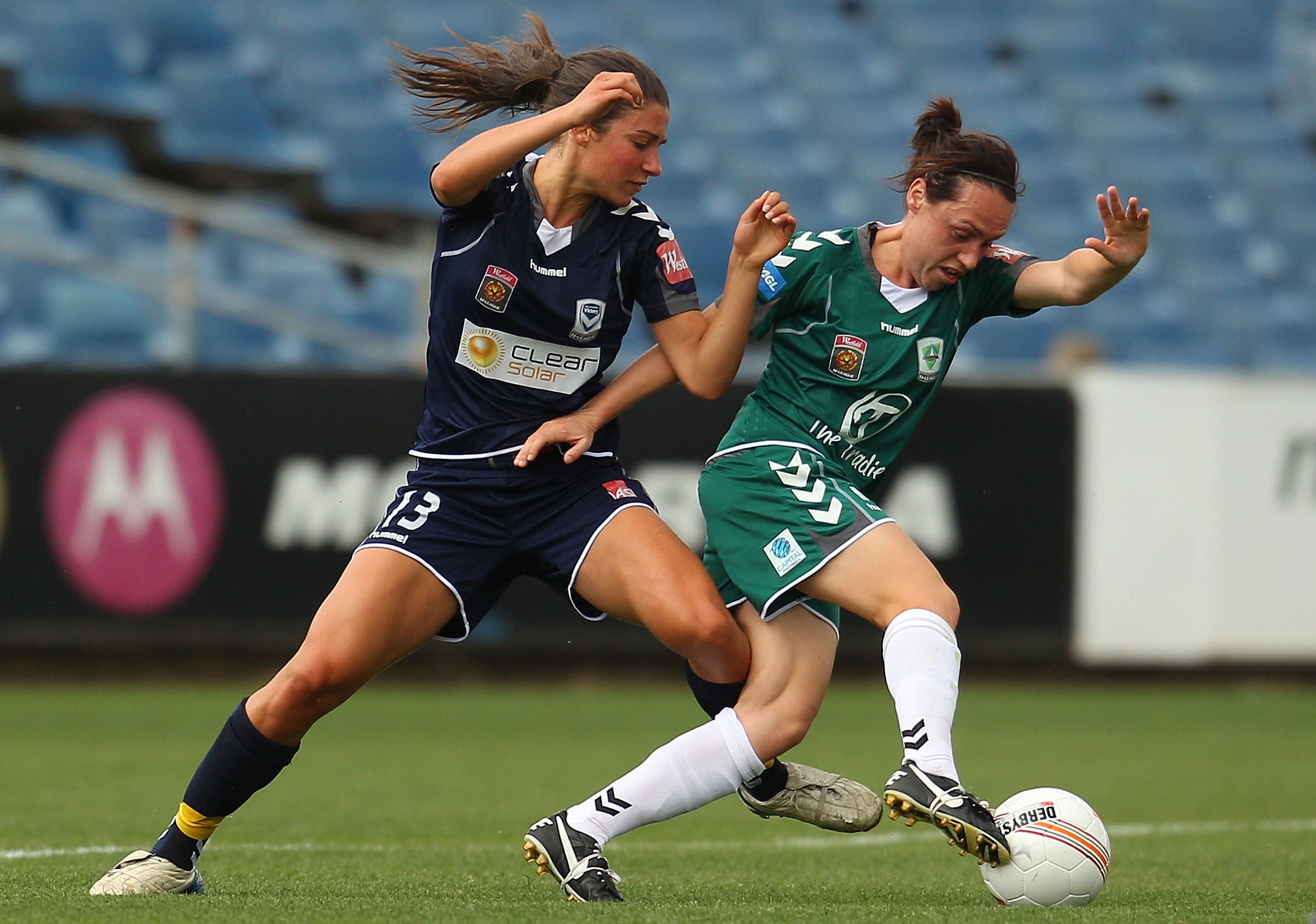 Leah Blayney (right), seen here playing for Canberra in the W-League in 2011, played 16  matches for Australia’s national side. Photo: Getty Images