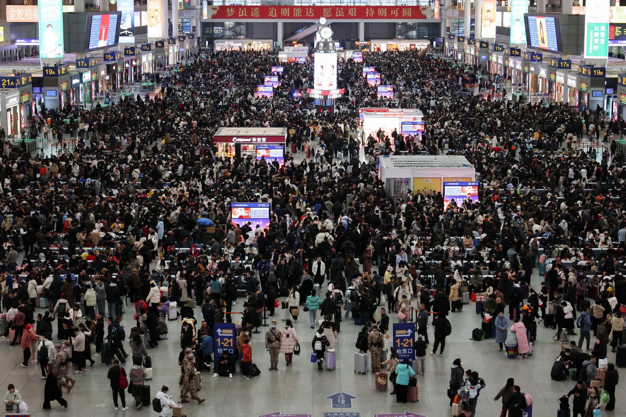 People wait for trains in Shanghai during the Spring Festival travel rush ahead of last year’s Lunar New Year. China’s railway operator said it had sold 140 million tickets by February 8. Photo: Reuters