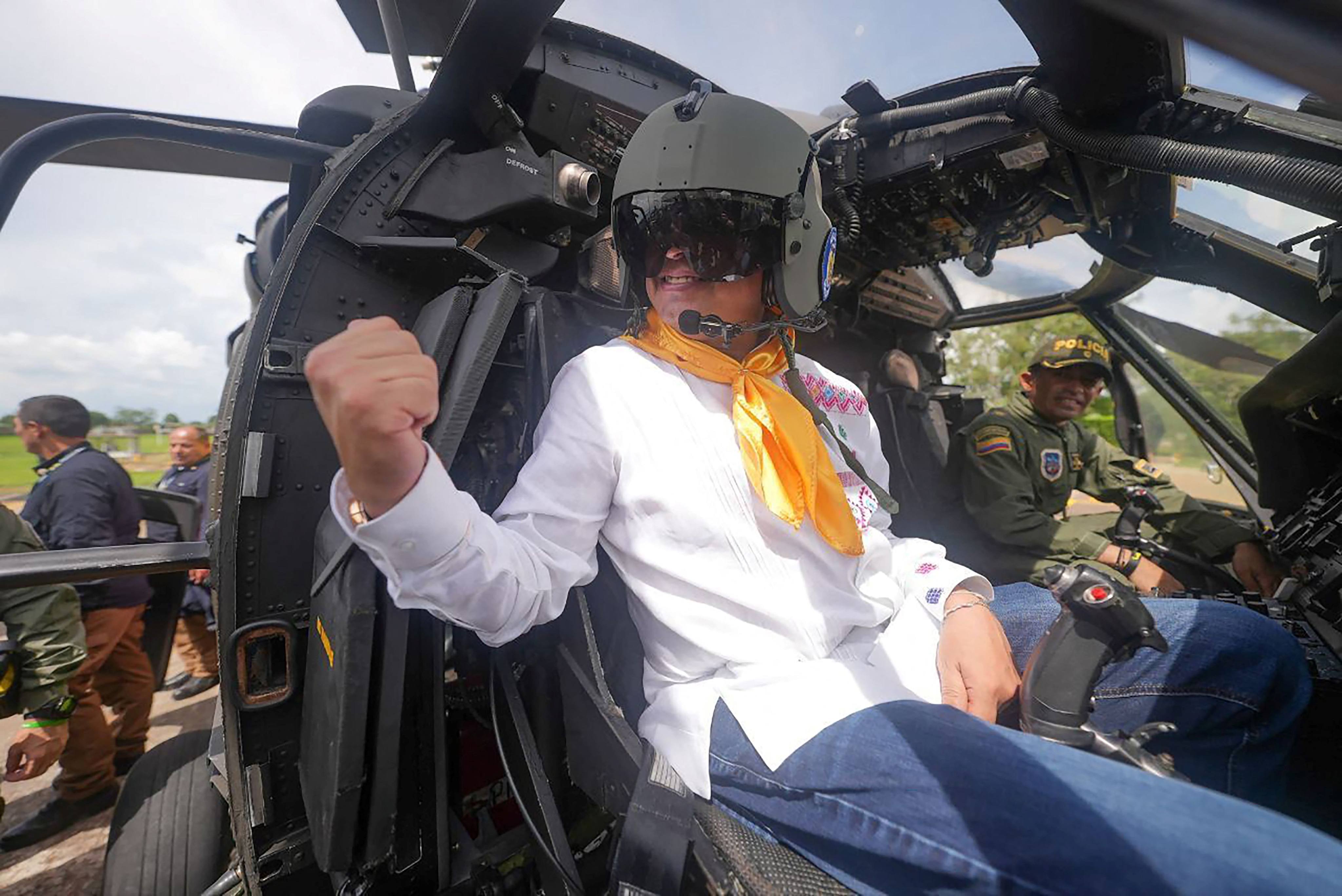 President Gustavo Petro in the cockpit of one of the 12 Black Hawk helicopters donated by the US government in 2022. Photo: Colombian Presidency via AFP