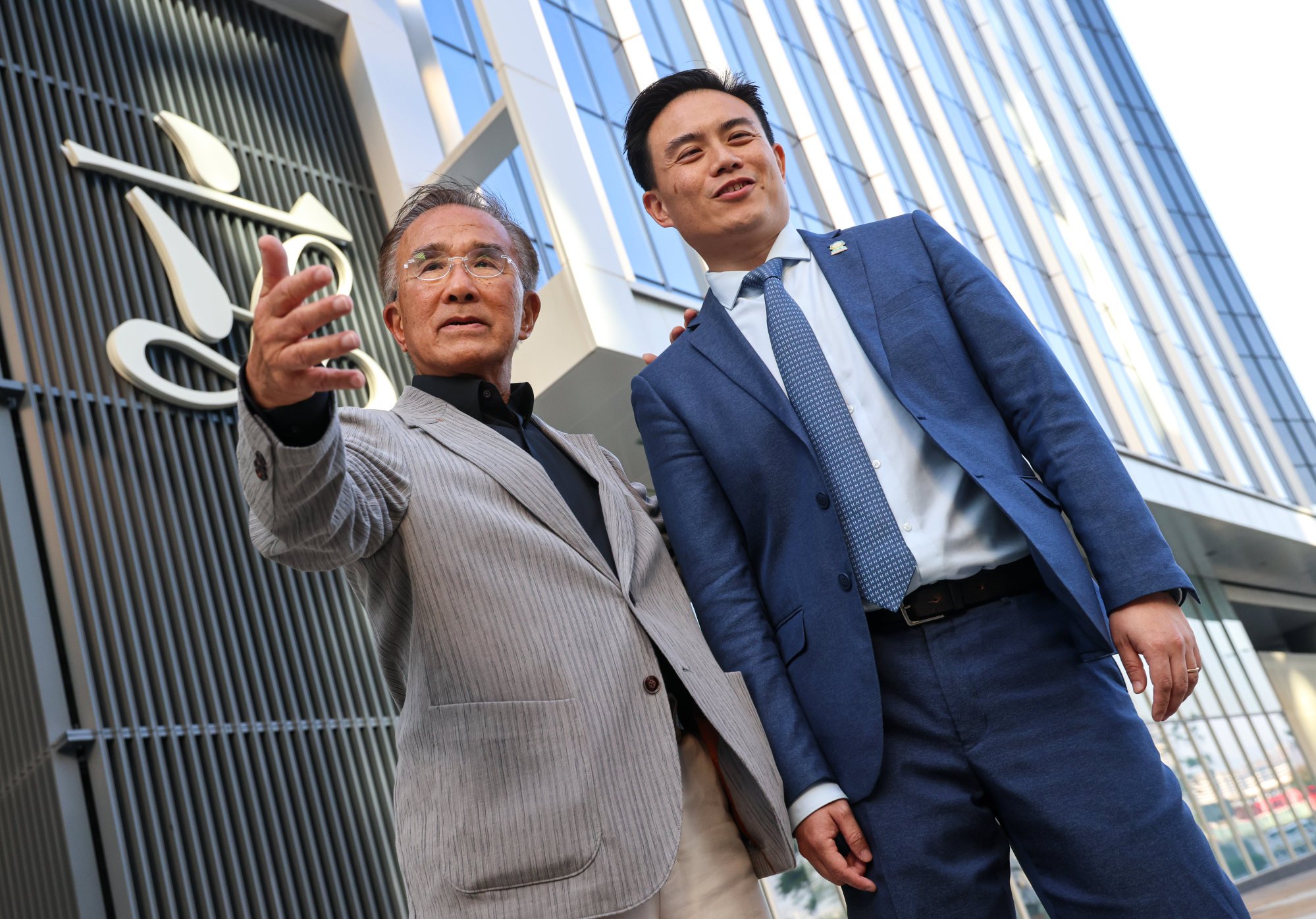 Mark Chong (right), who succeeded veteran lawmaker Michael Tien (left), spent more than HK$2.7 million on his election campaign. Photo: Jelly Tse