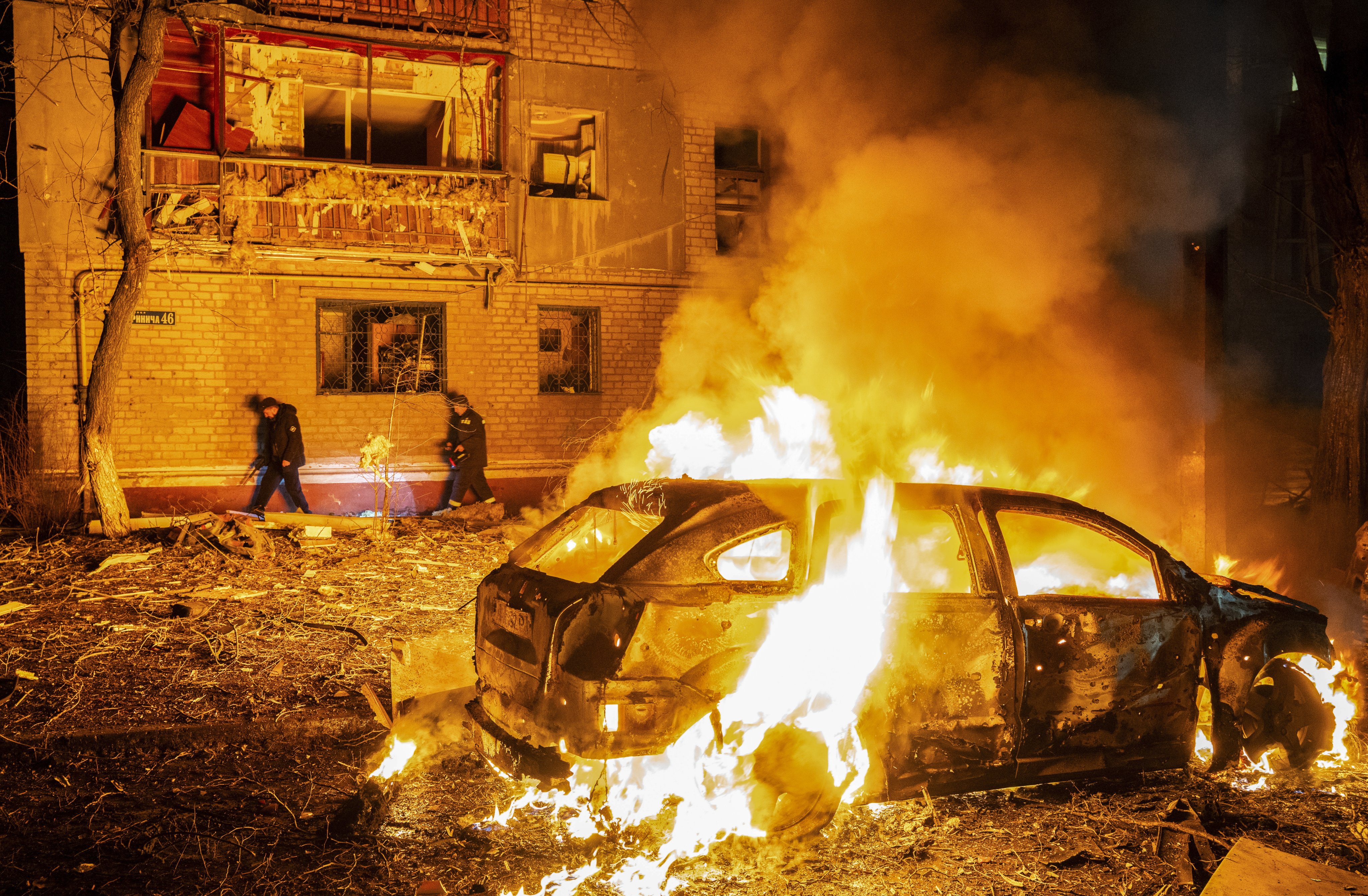 Ukrainian rescuers work at the site of a Russian early-morning guided bomb strike on a residential area in Donetsk region on Thursday. Photo: EPA