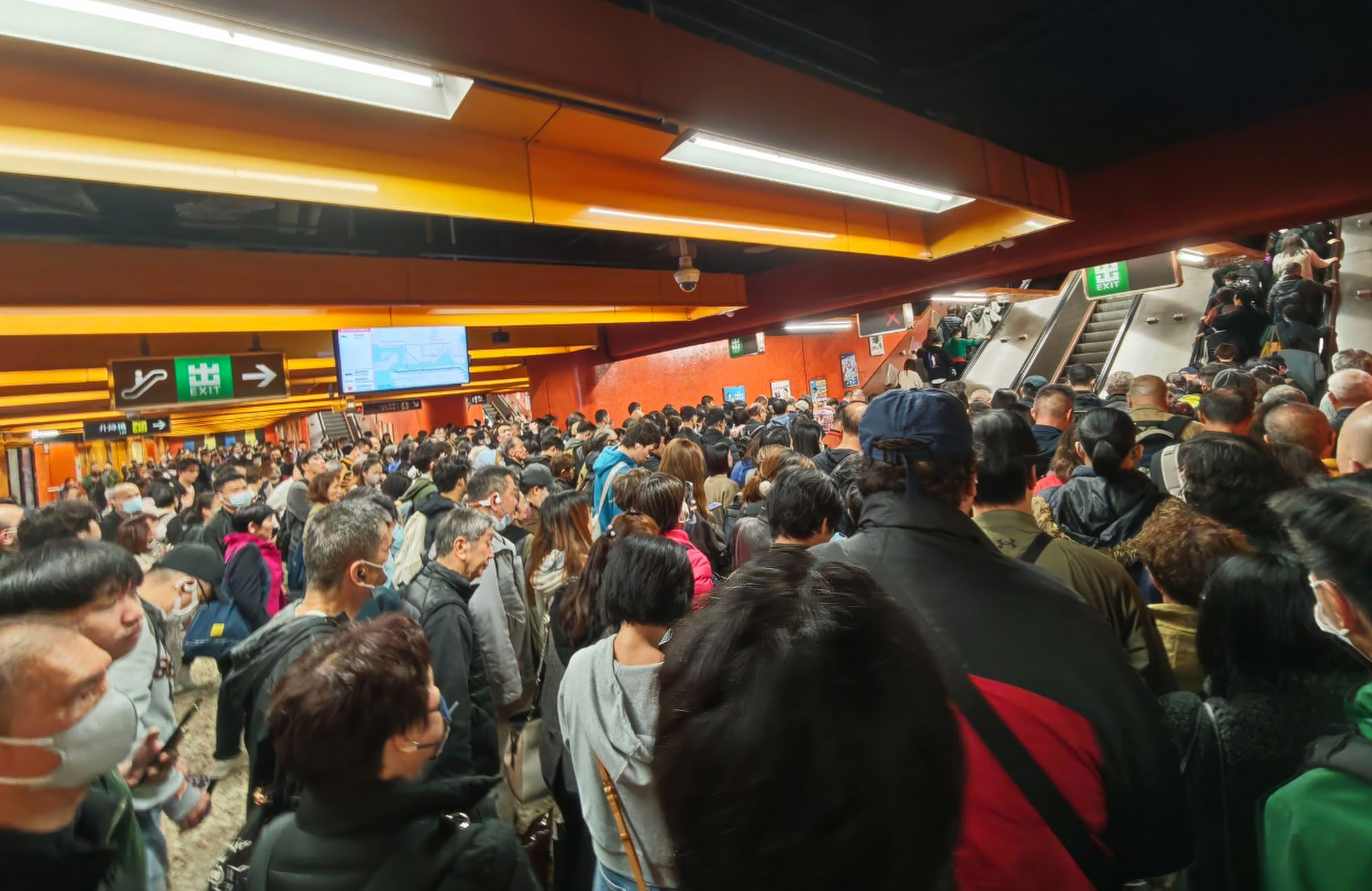 Crowds of passengers exit North Point station due to the suspension of the MTR’s Island line on February 11. Photo: Handout