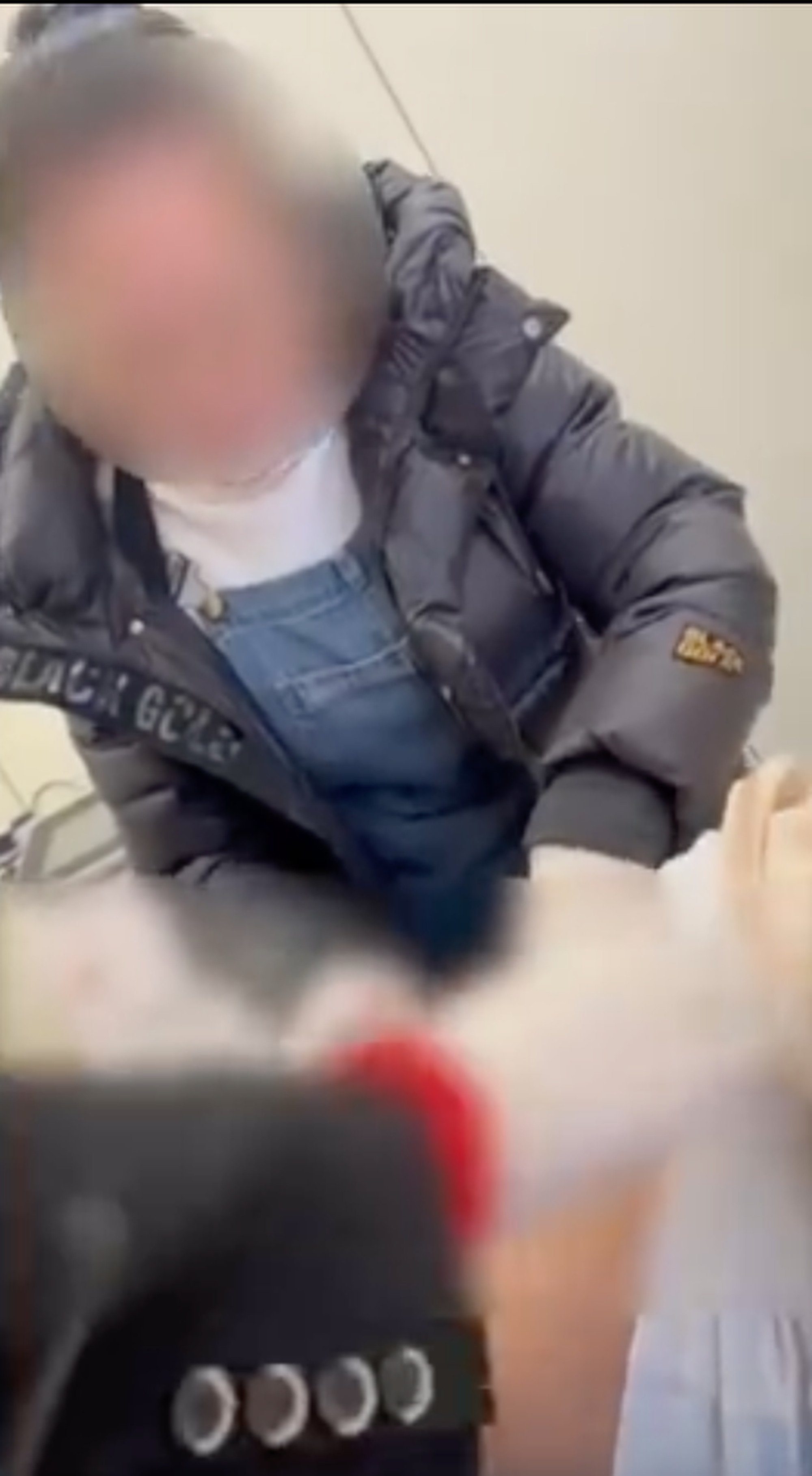 One of the so-called doctors, above, can be seen “treating” the man while wearing ordinary clothes. Photo: Weibo One of the so-called doctors, above, can be seen “treating” the man while wearing ordinary clothes. Photo: Weibo