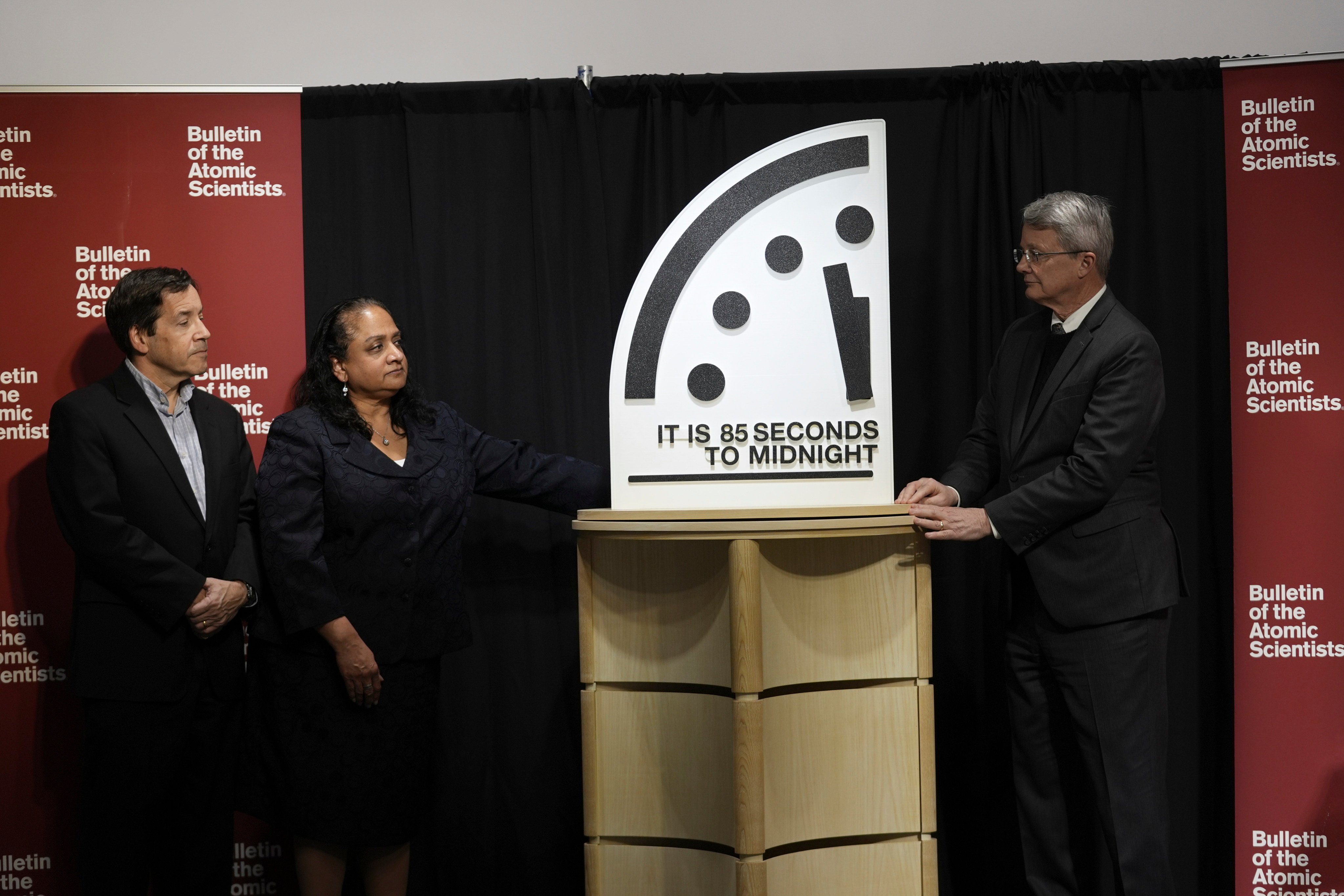 The Bulletin of the Atomic Scientists members reveal the Doomsday Clock, set to 85 seconds to midnight. Photo: AP