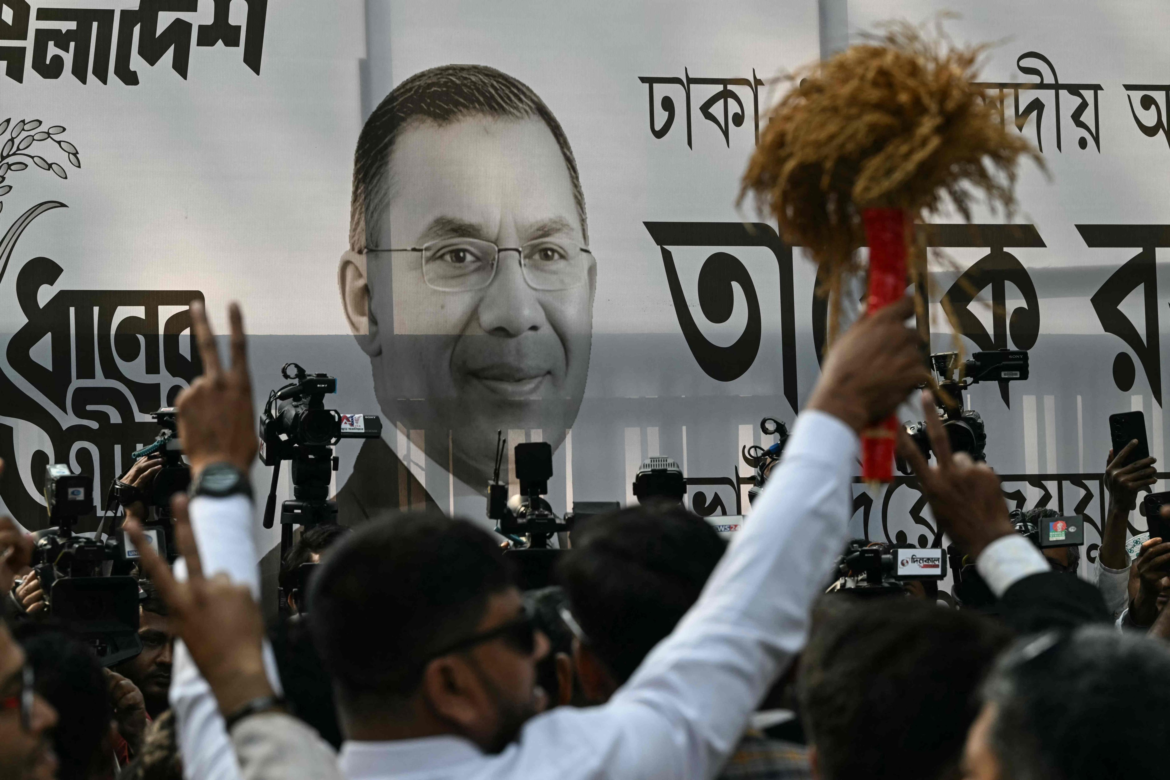 A poster of Bangladesh Nationalist Party (BNP) chairman and election candidate Tarique Rahman is displayed outside the party office in Dhaka on Friday. Photo: AFP