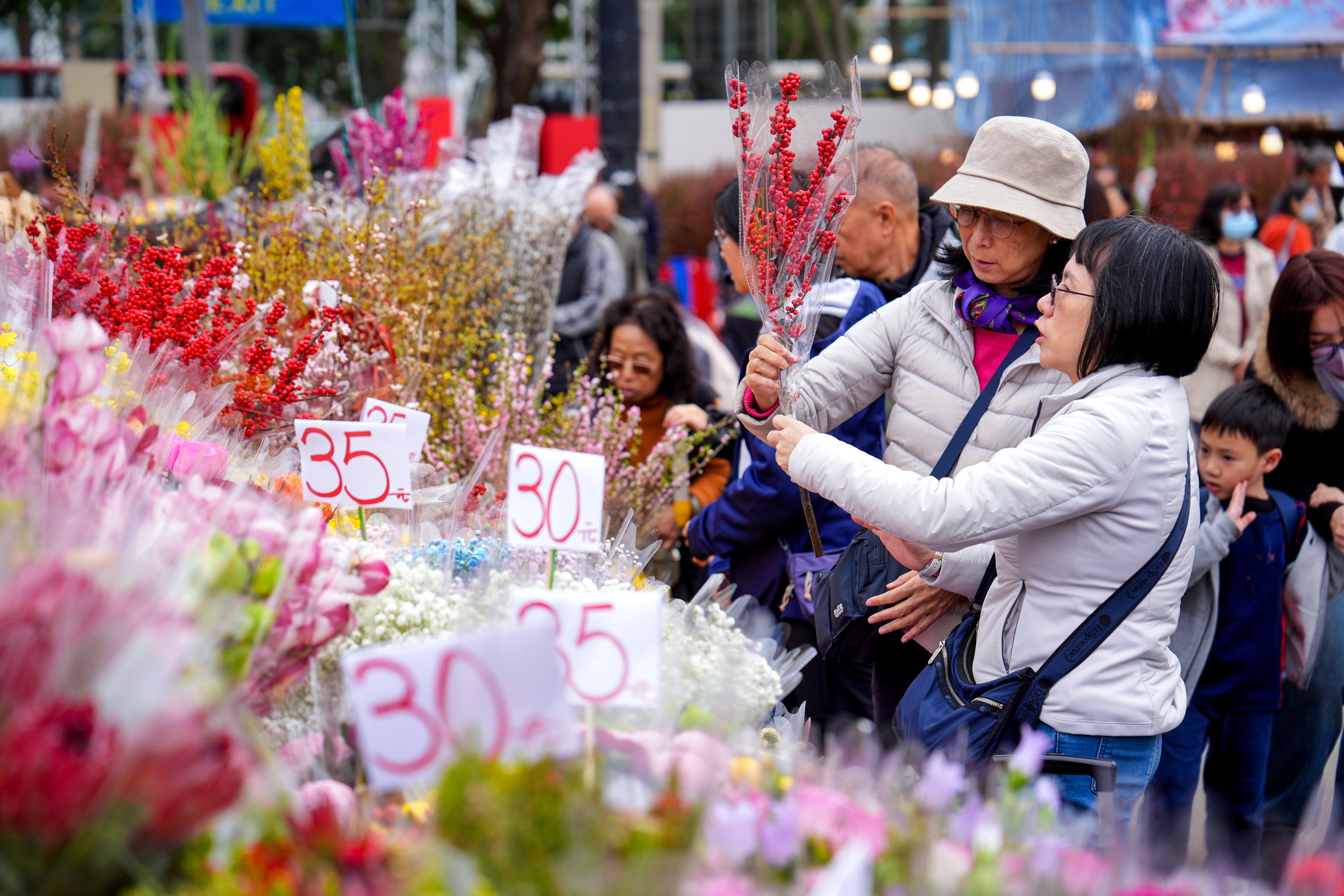 People browse stalls at the Lunar New Year flower market in Victoria Park on February 12.  Photo: Elson Li