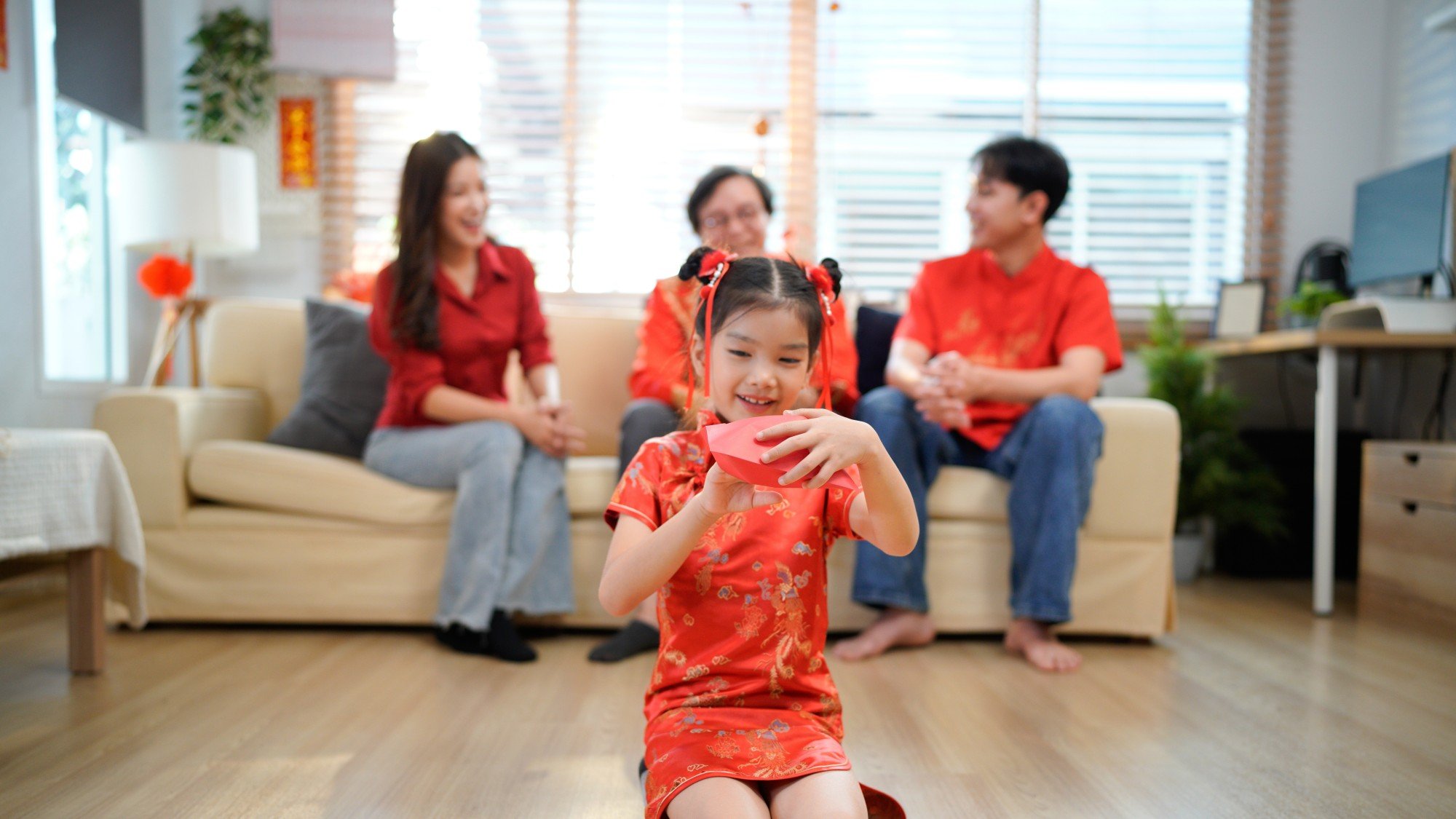 In China, it’s traditional for adults to gift children or unmarried individuals, regardless of age, lucky money wrapped in red envelopes during the Spring Festival, wishing them luck and health for the coming year. Photo: Shutterstock In China, it’s traditional for adults to gift children or unmarried individuals, regardless of age, lucky money wrapped in red envelopes during the Spring Festival, wishing them luck and health for the coming year. Photo: Shutterstock
