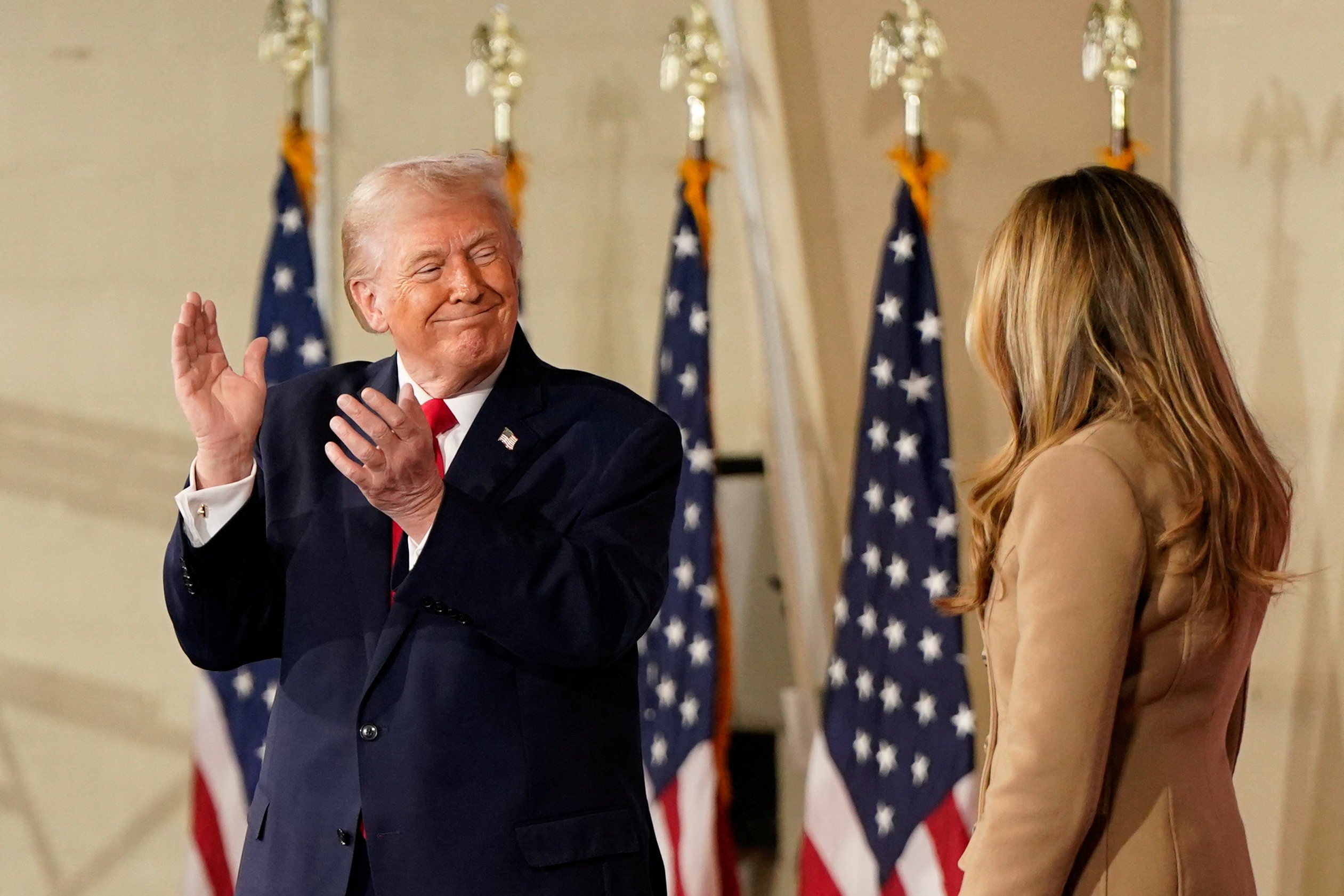 US President Donald Trump applauds as he looks at first lady Melania Trump during a visit at Fort Bragg, North Carolina, on Friday. Photo: Reuters