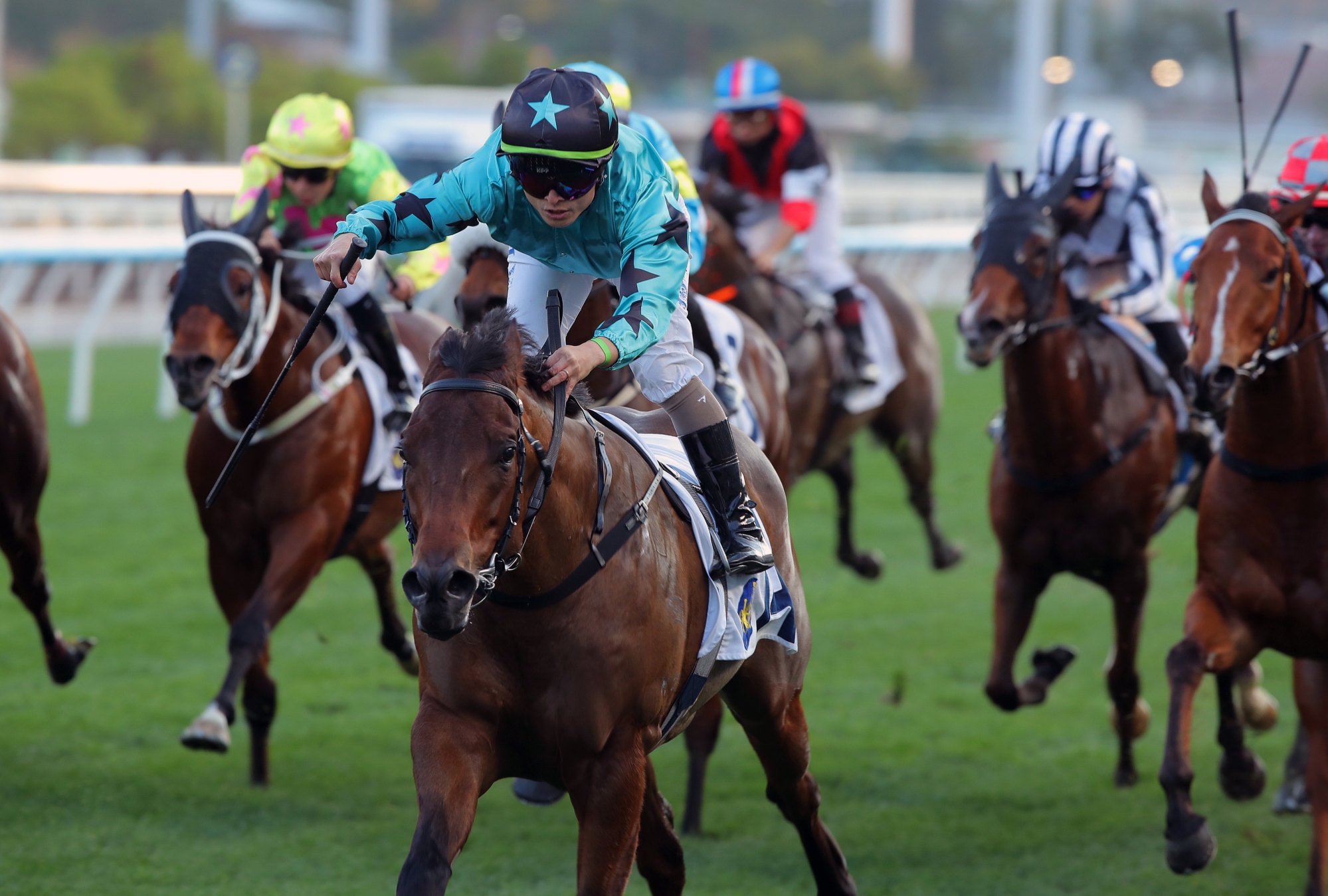 Keith Yeung boots home Turquoise Velocity at Sha Tin.