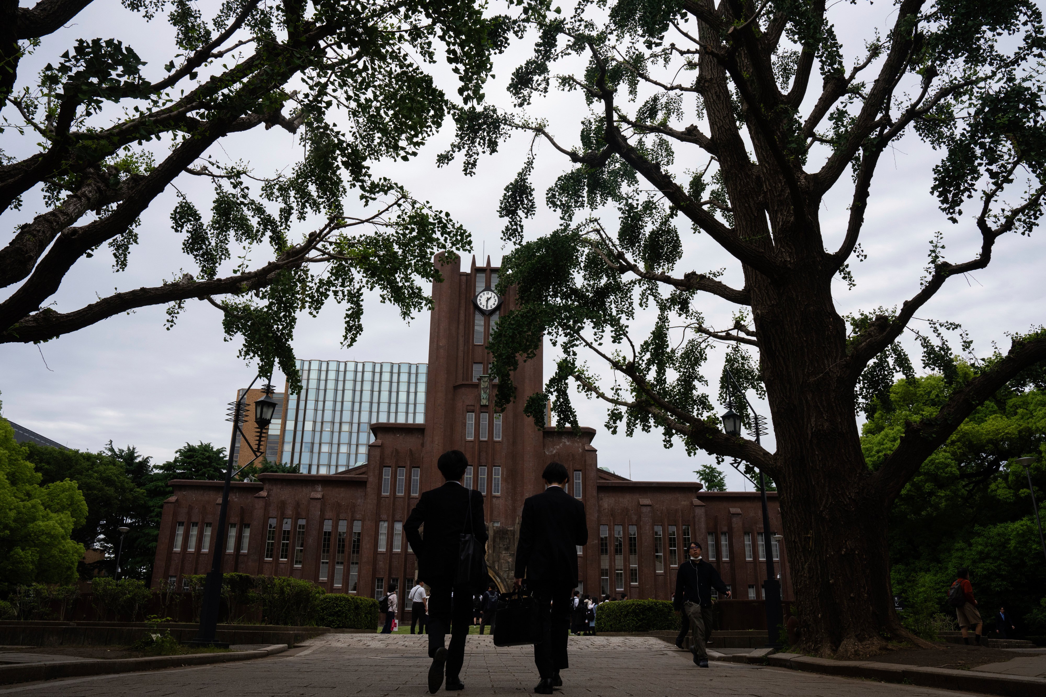 People walk through the University of Tokyo on May 27, 2025. Photo: AP