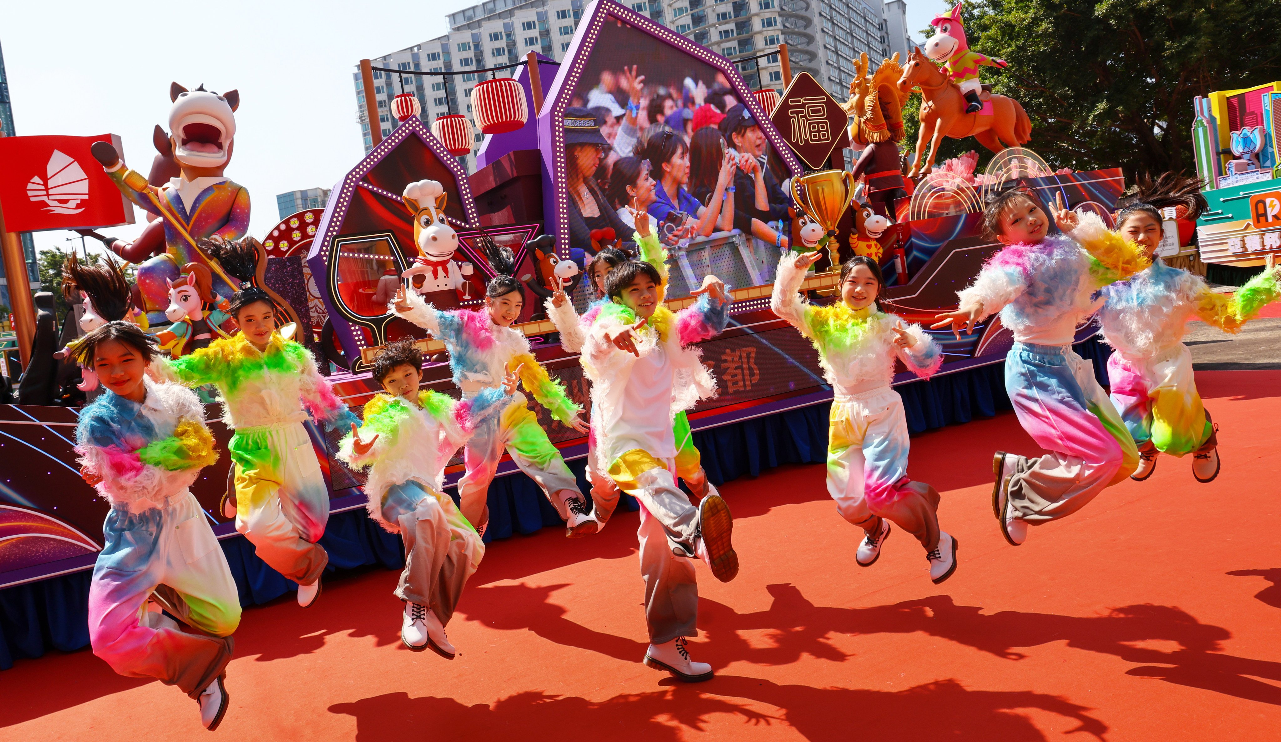 Hong Kong Tourism Board’s float and young dancers showcase their talents. Photo: Dickson Lee