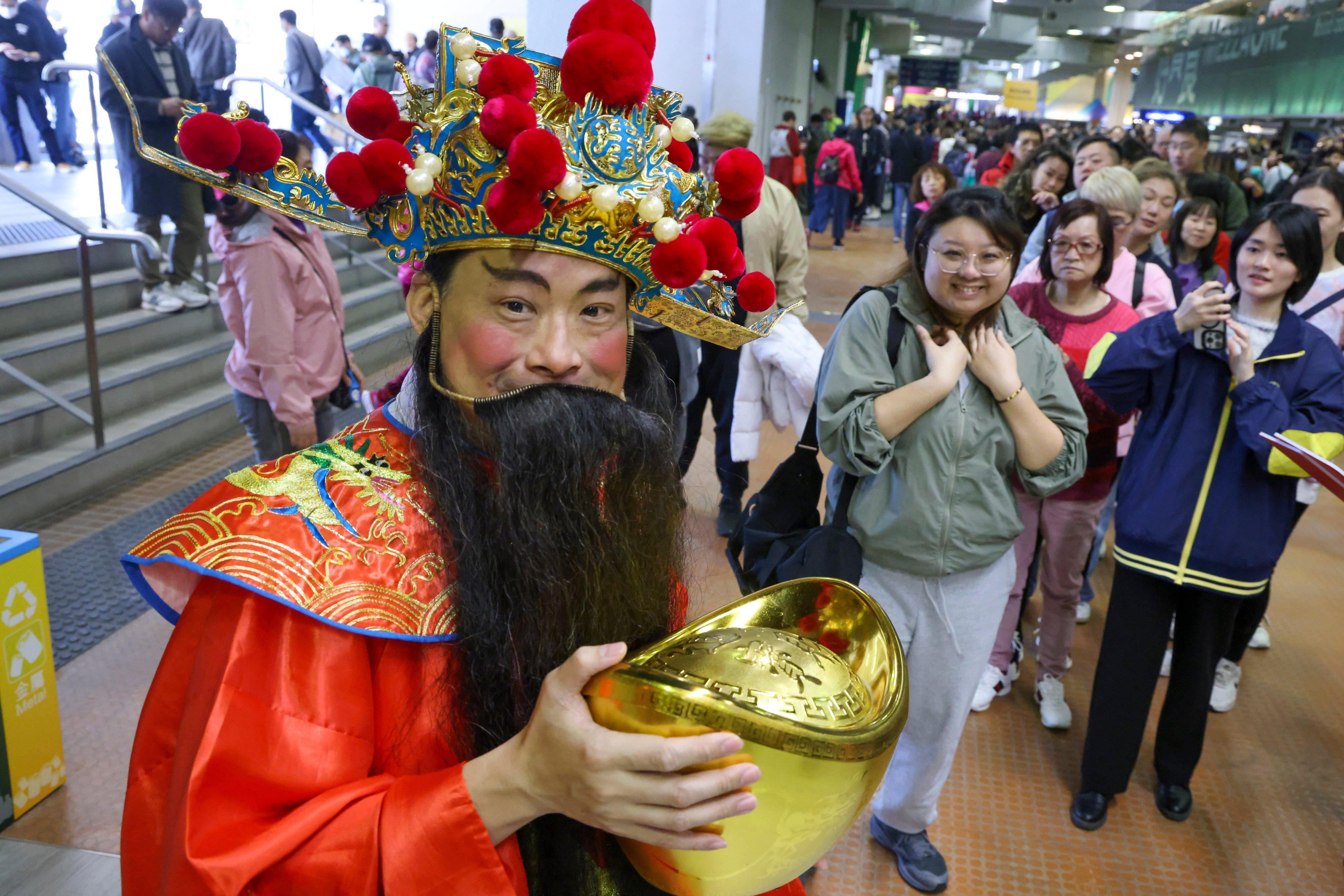 A performer dressed as the God of Wealth for Chinese New Year Raceday at Sha Tin Racecourse in 2024. Photo: Dickson Lee