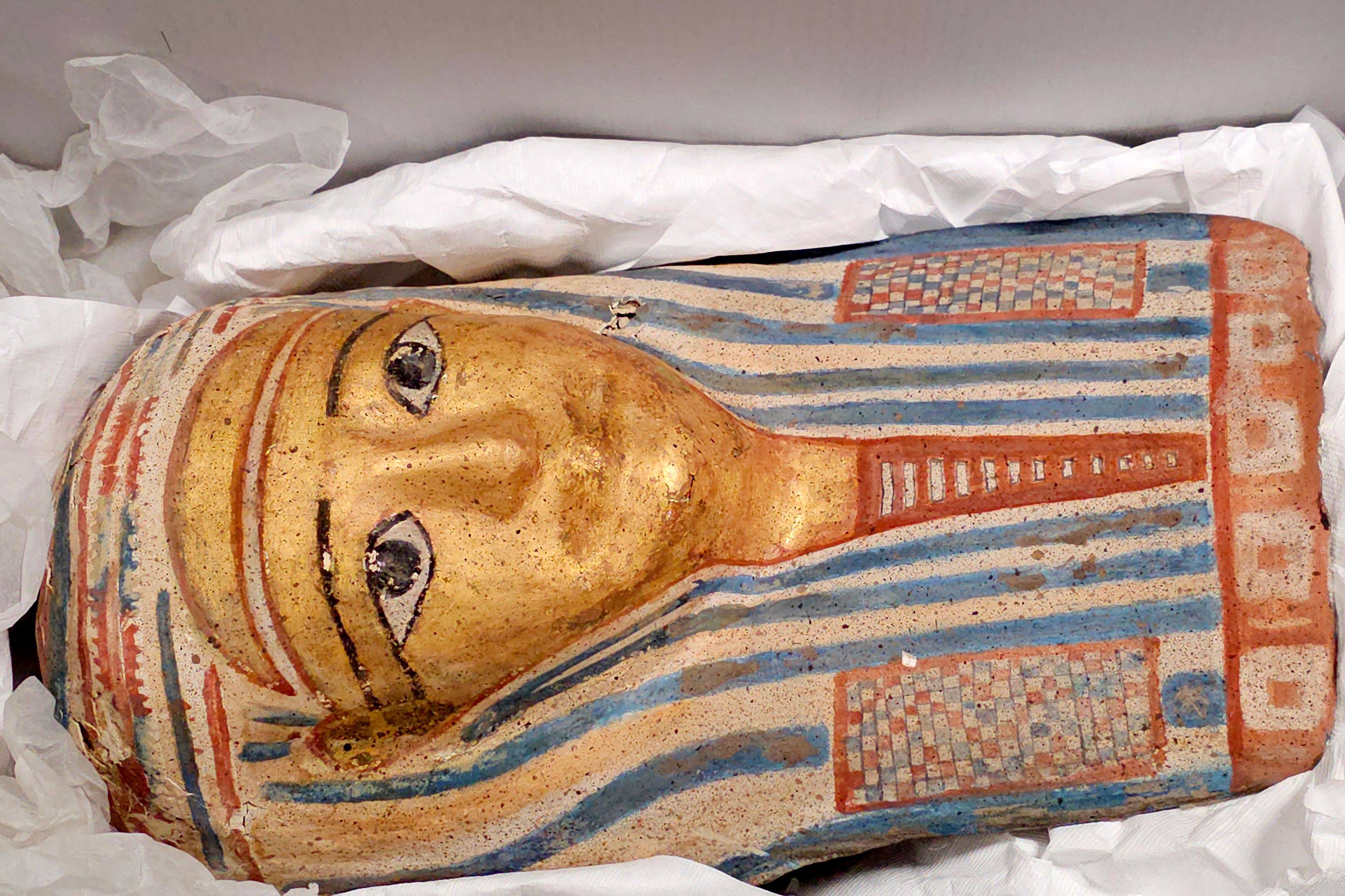 A mummy mask recovered from a theft at the Abbey Museum of Art and Archaeology. Photo: Queensland Police/AFP