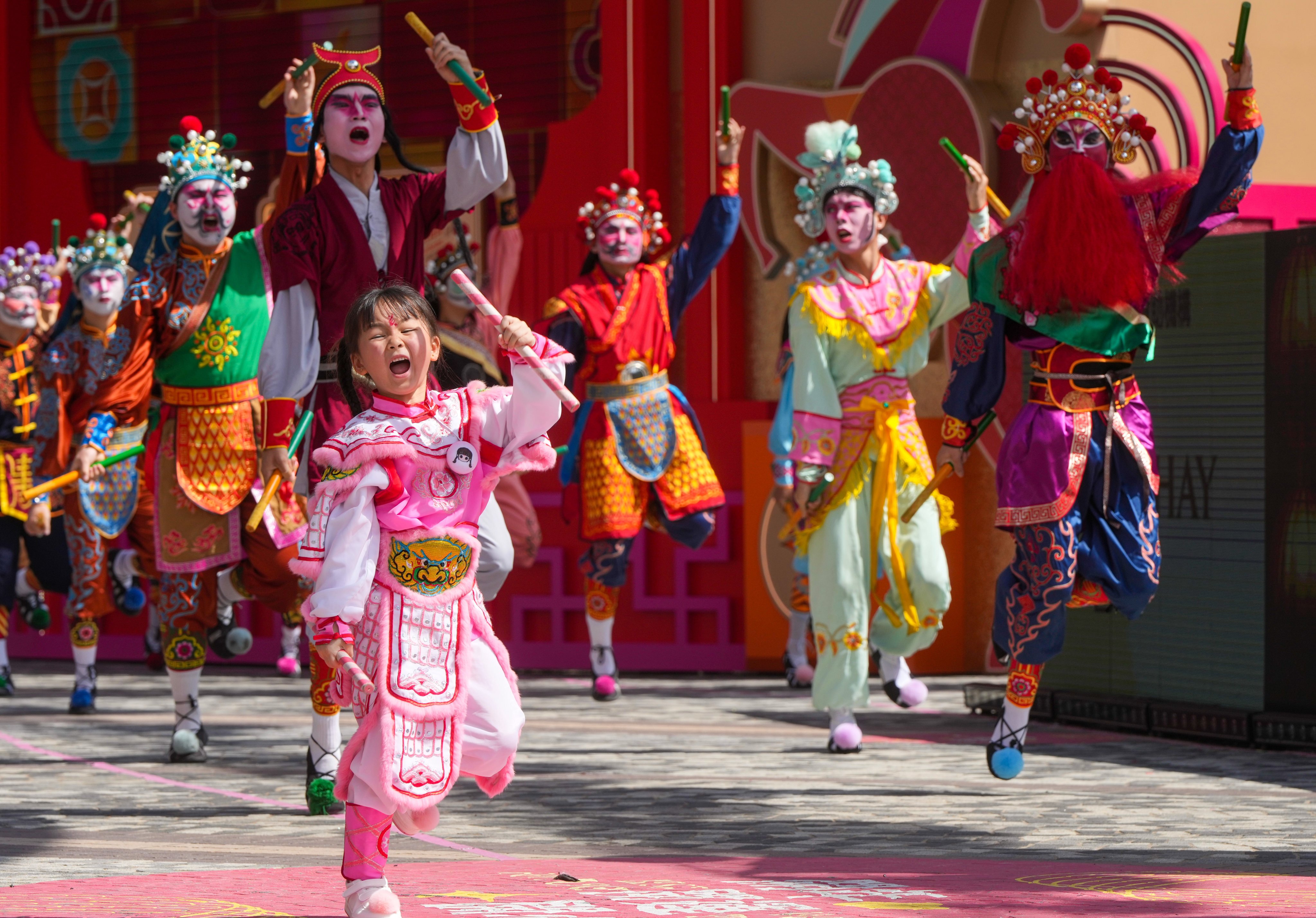 A traditional dance troupe takes part in a rehearsal for the Cathay International Chinese New Year Night Parade. Photo: Sam Tsang