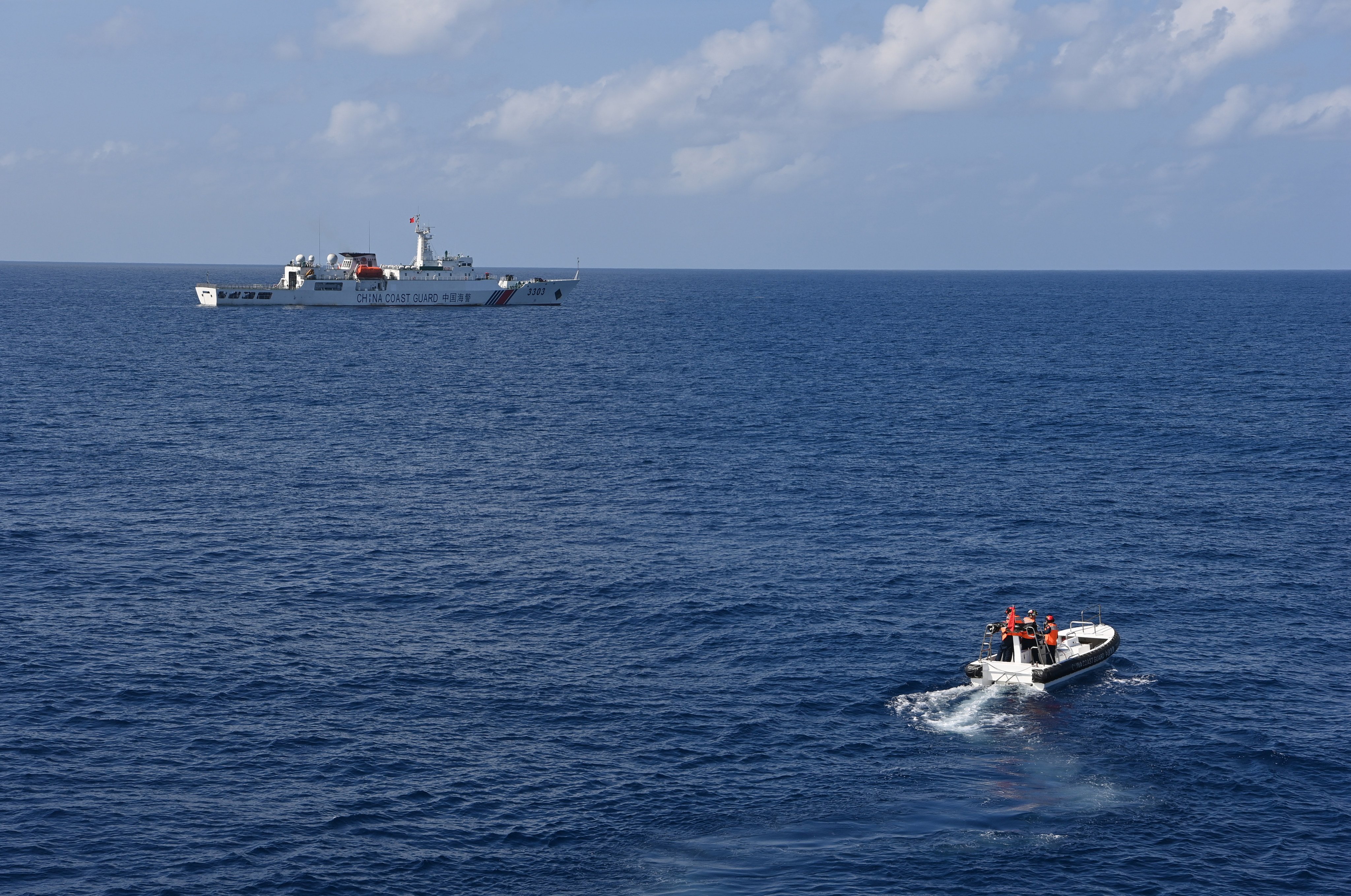 Chinese coastguard vessels carry out a law enforcement drill in the South China Sea on February 4. Photo: Xinhua