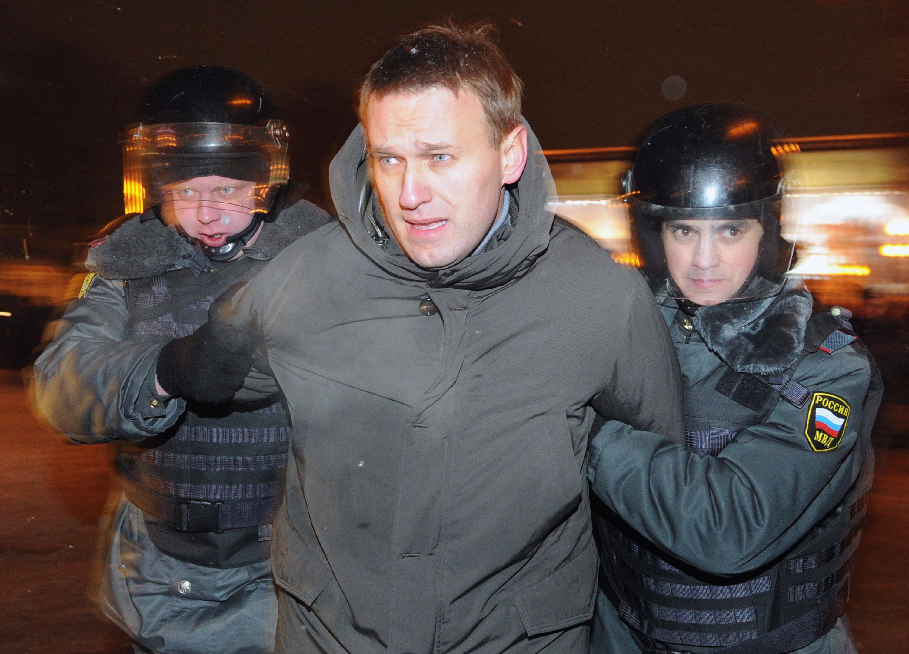 Police officers detain Alexei Navalny in Moscow on March 5, 2012. The Russian opposition leader died in an Arctic prison colony on February 16, 2024, in murky circumstances. Photo: AFP
