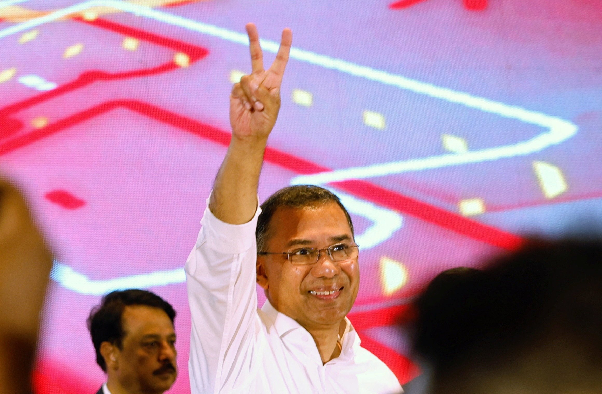 Tarique Rahman, chairman of Bangladesh Nationalist Party (BNP), shows a victory sign following the BNP’s victory in the general election, in Dhaka, Bangladesh, on Saturday. Photo: Reuters