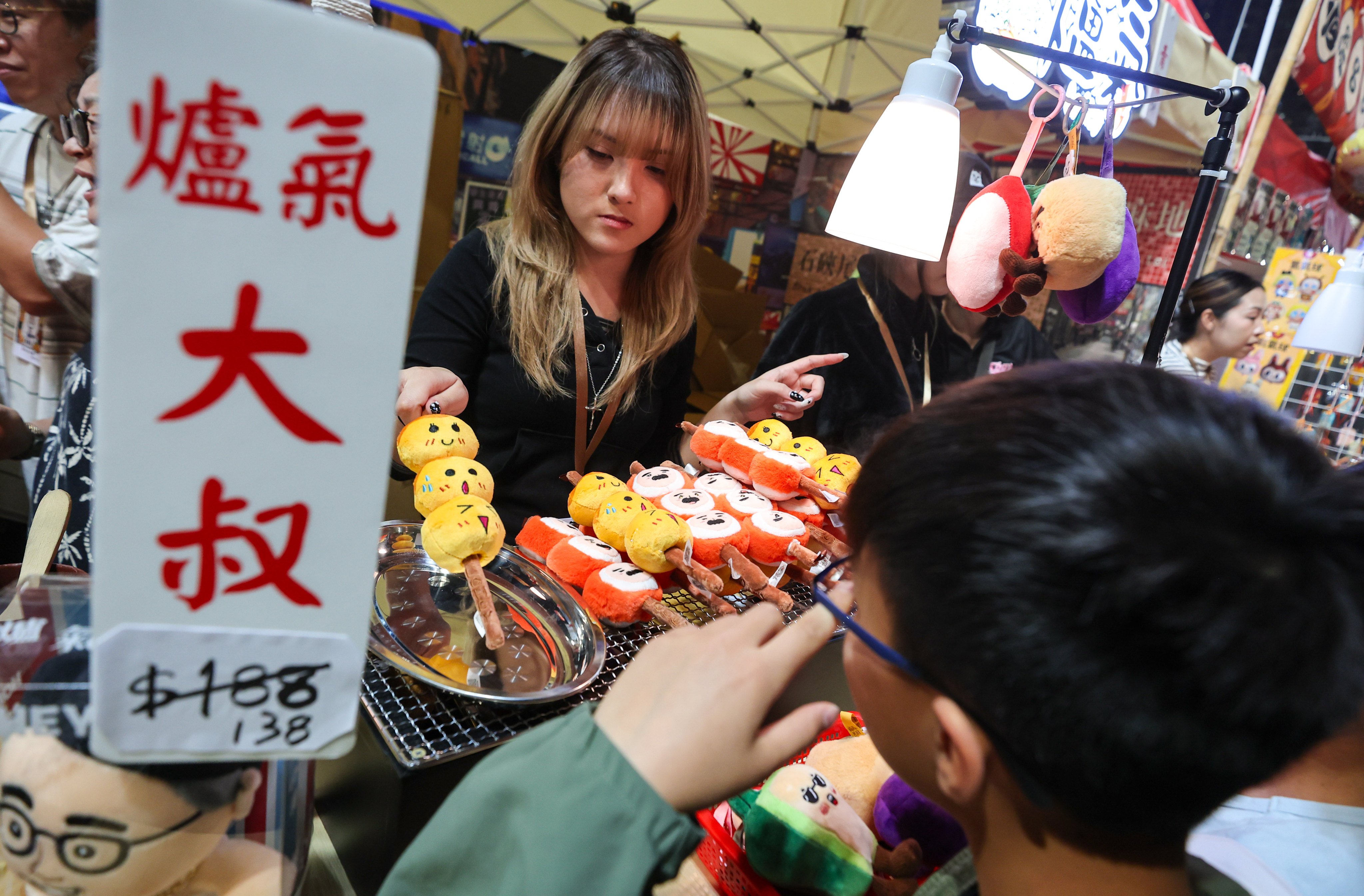 Hong Kong’s Lunar New Year fair at Victoria Park saw record sales with plushies inspired by local street food as top sellers, drawing huge crowds. Photo: Edmond So