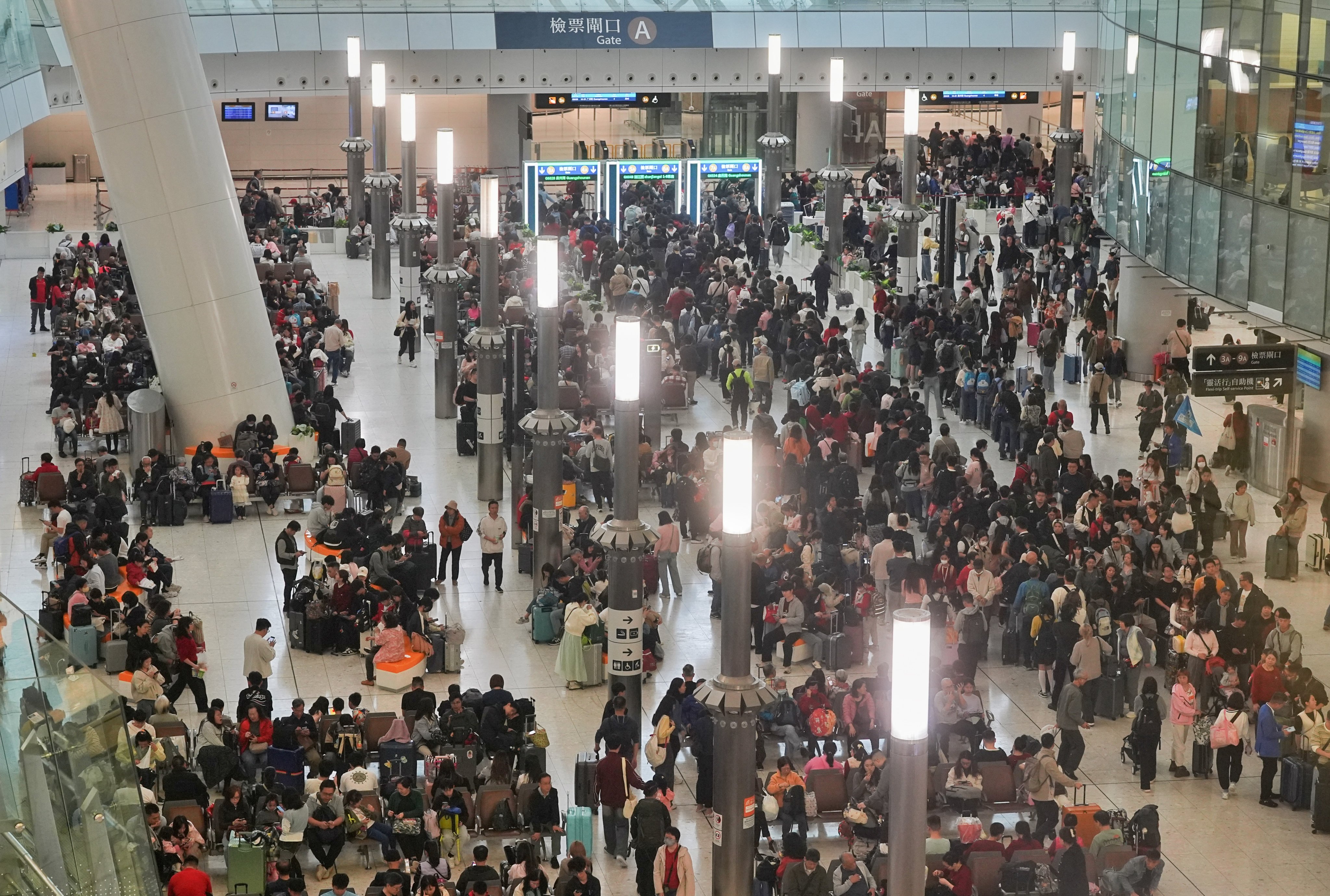 Crowds filled Hong Kong’s airport on the first day of the Lunar New Year. Photo:  Elson Li
