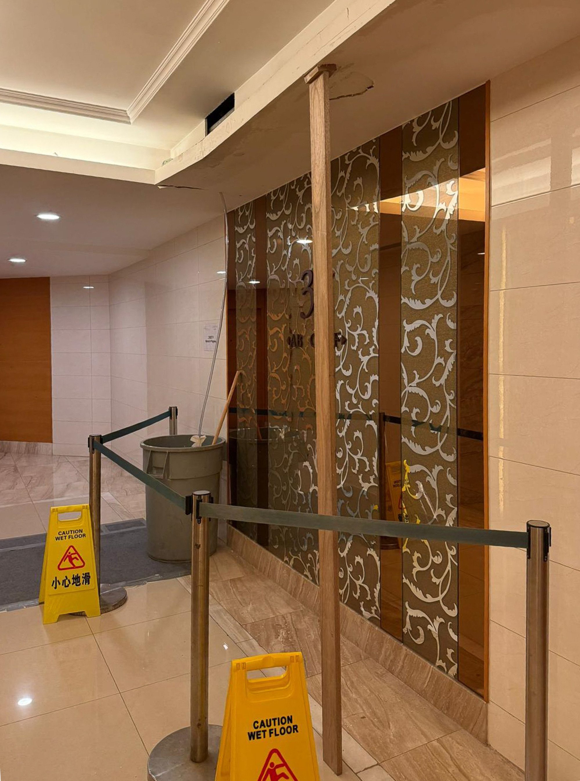 The ceiling of a lift lobby of one of the estate’s residential towers also has cracks in it. Photo: Handout The ceiling of a lift lobby of one of the estate’s residential towers also has cracks in it. Photo: Handout