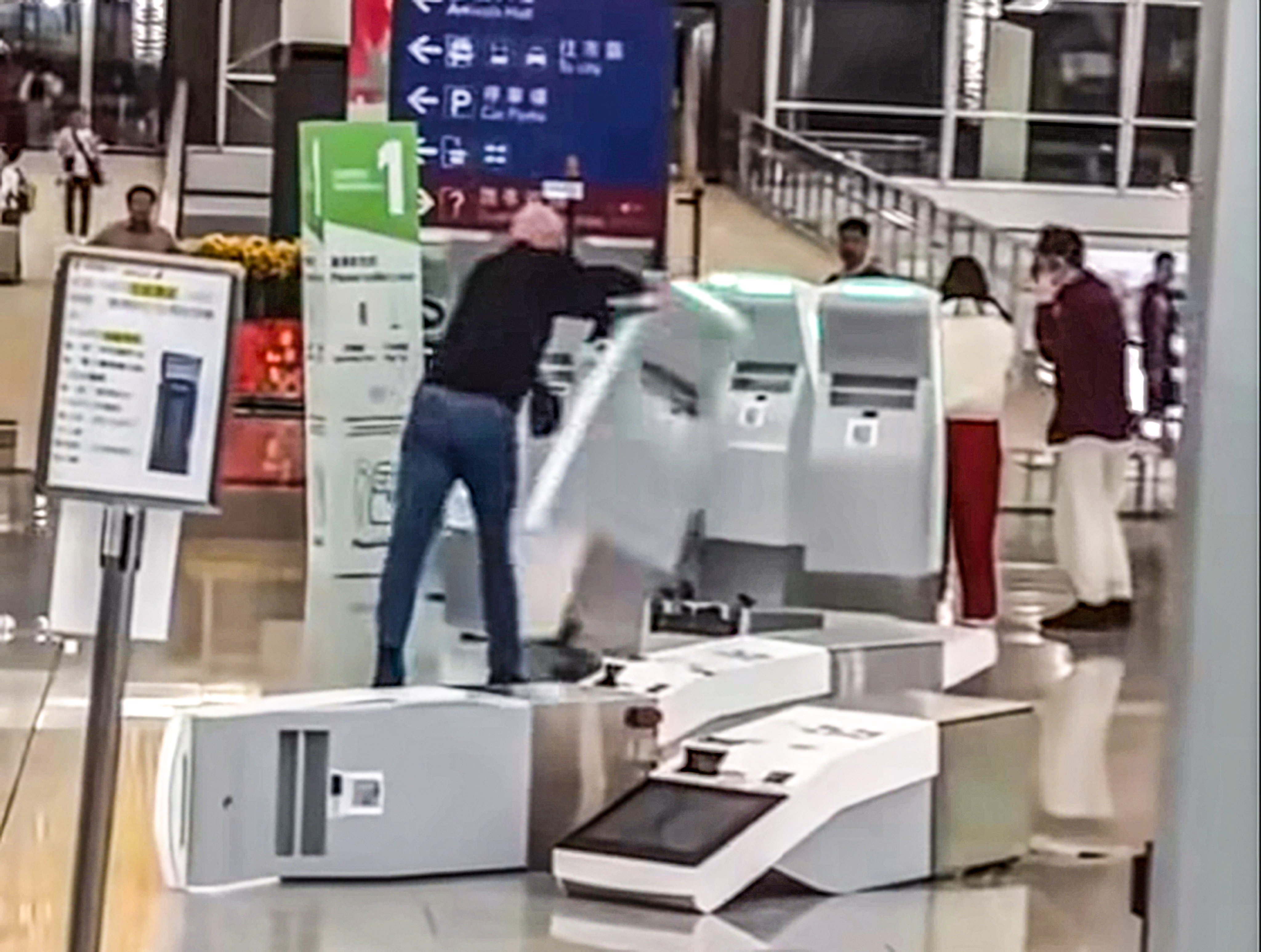 A video on social media showed Youcef Bennoui, 35,  pushing over several self-check-in kiosks in the departure hall and repeatedly striking them with a stanchion. Photo: Handout