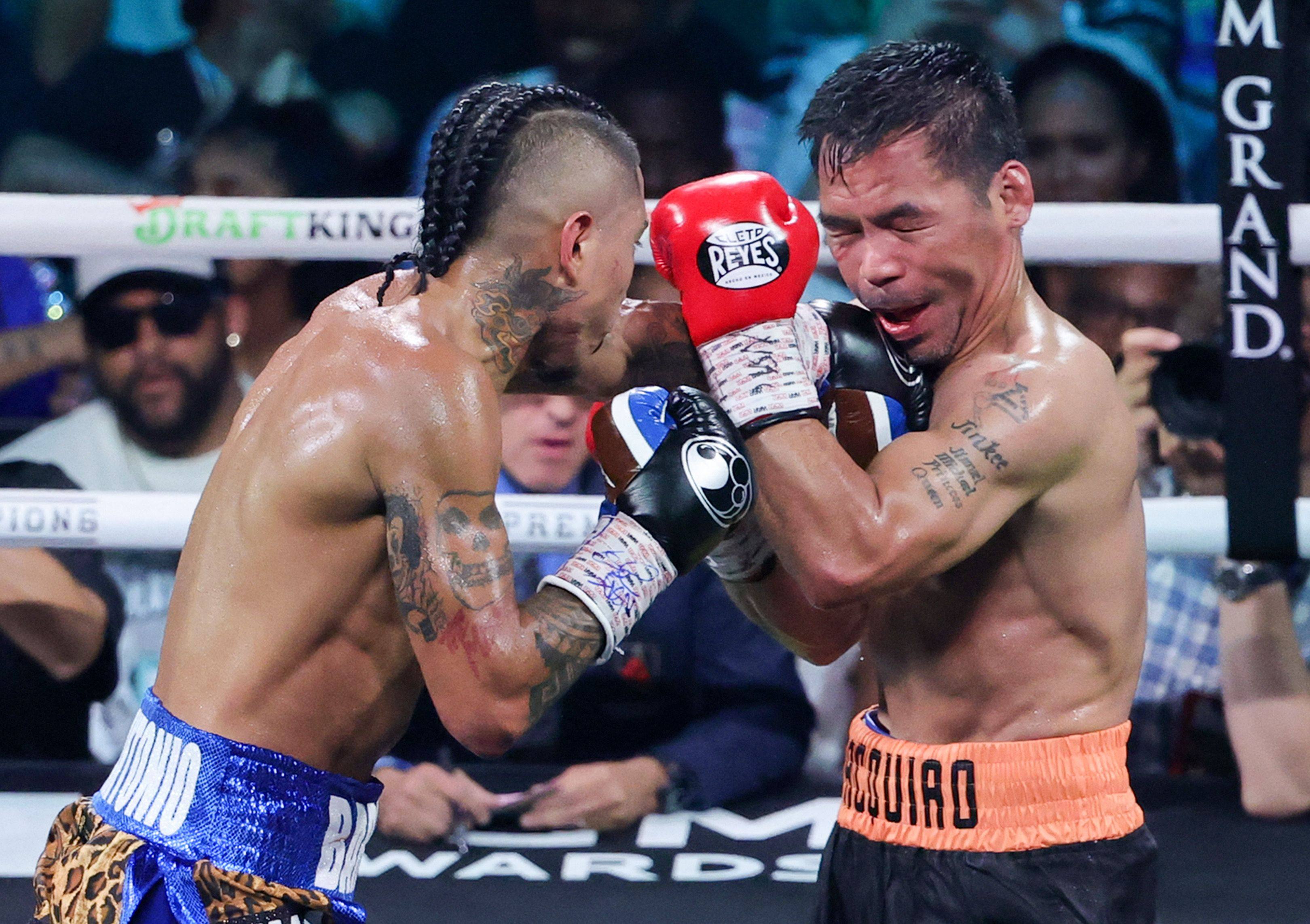 Mario Barrios (left) hits Manny Pacquiao in the 10th round of their WBC welterweight title fight at MGM Grand Garden Arena on July 19, 2025 in Las Vegas. Photo: AFP