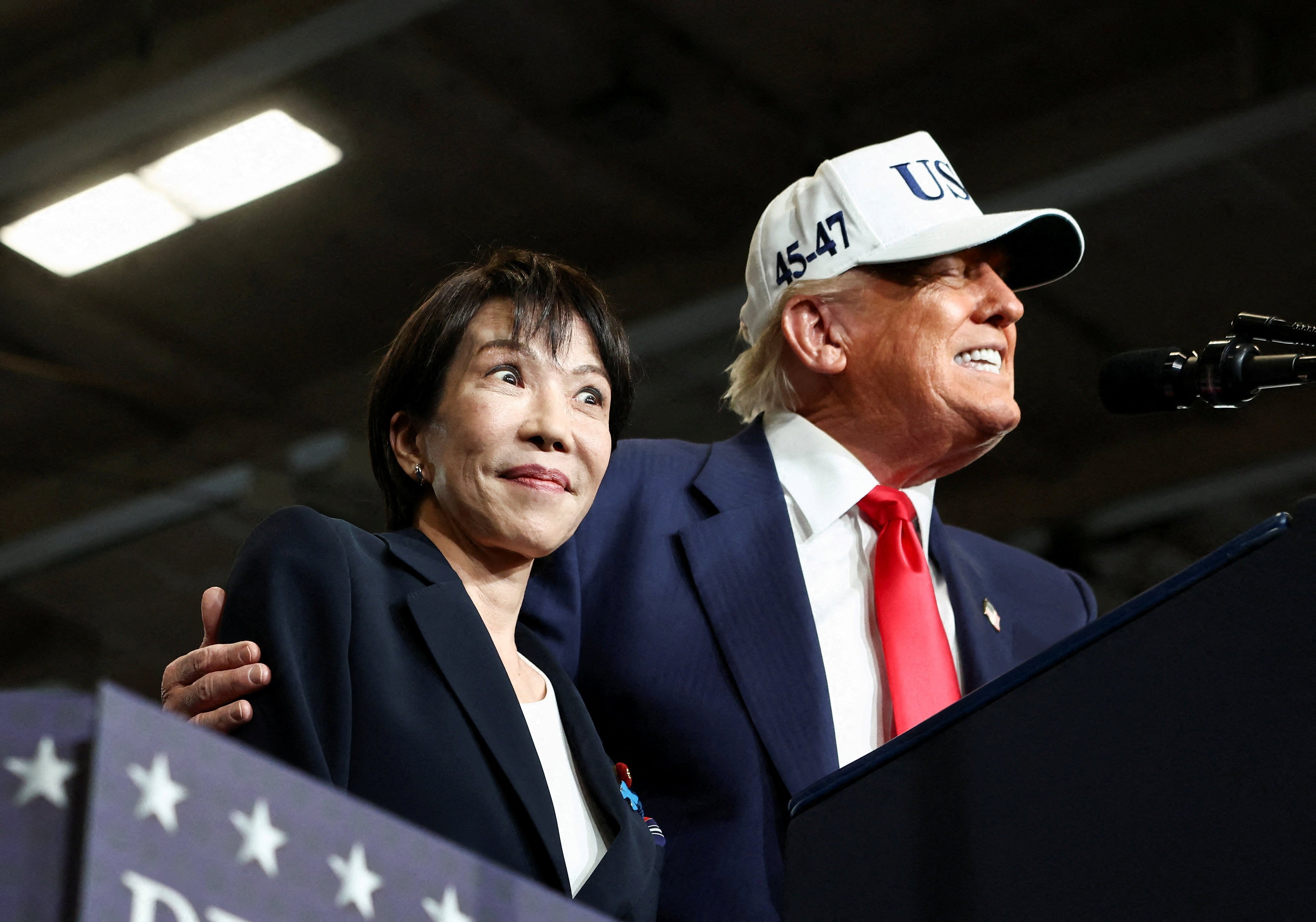 US President Donald Trump speaks alongside Japanese Prime Minister Sanae Takaichi aboard the aircraft carrier USS George Washington at  the US Navy base in Yokosuka, Japan, in October. Photo: Reuters