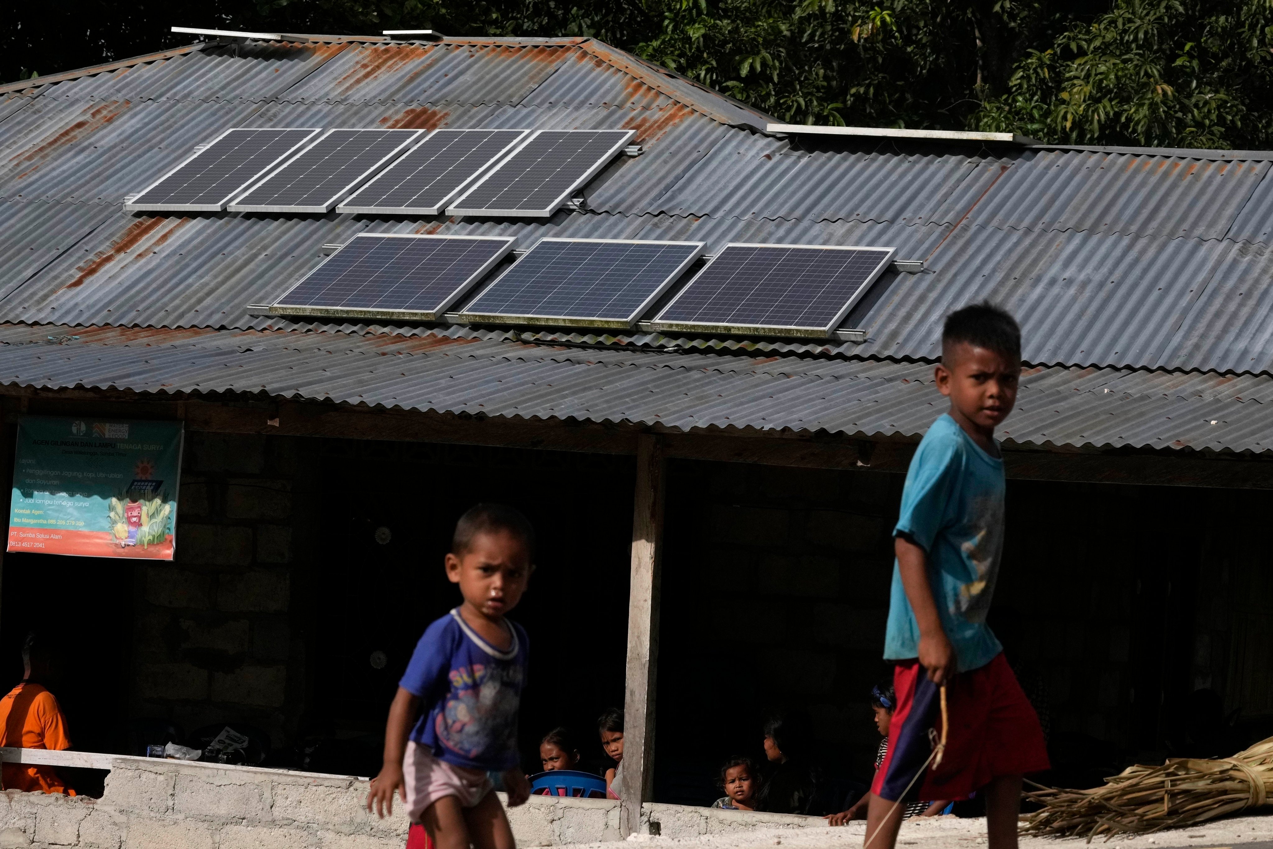 Zinc roofs on top of a house in Walatungga village, Sumba Island, Indonesia. Photo: AP