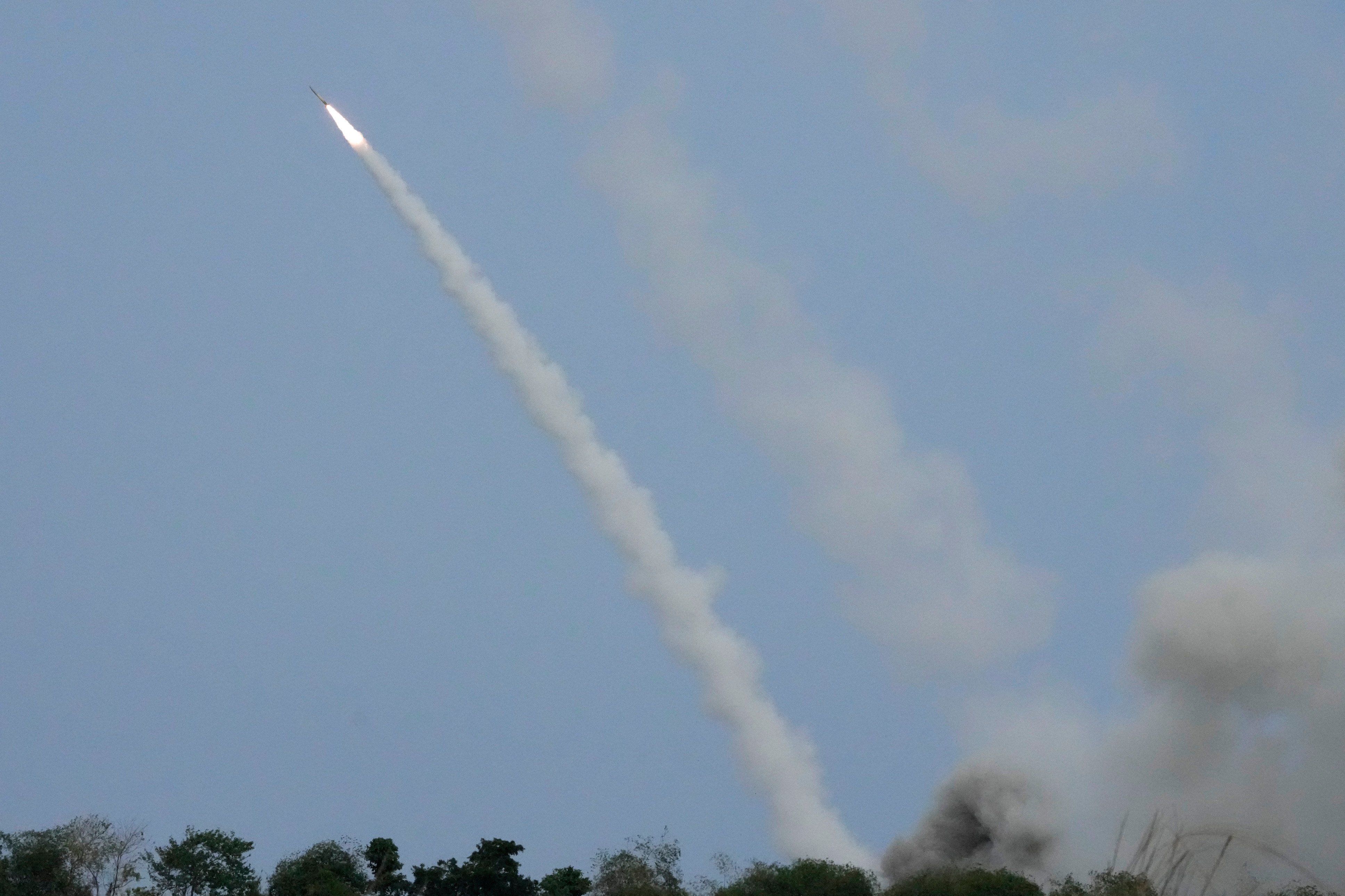 A US M142 High Mobility Artillery Rocket System, or HIMARS, fires during the Balikatan joint military exercises at a naval station in Zambales province, northern Philippines, on April 26, 2023. Photo: AP