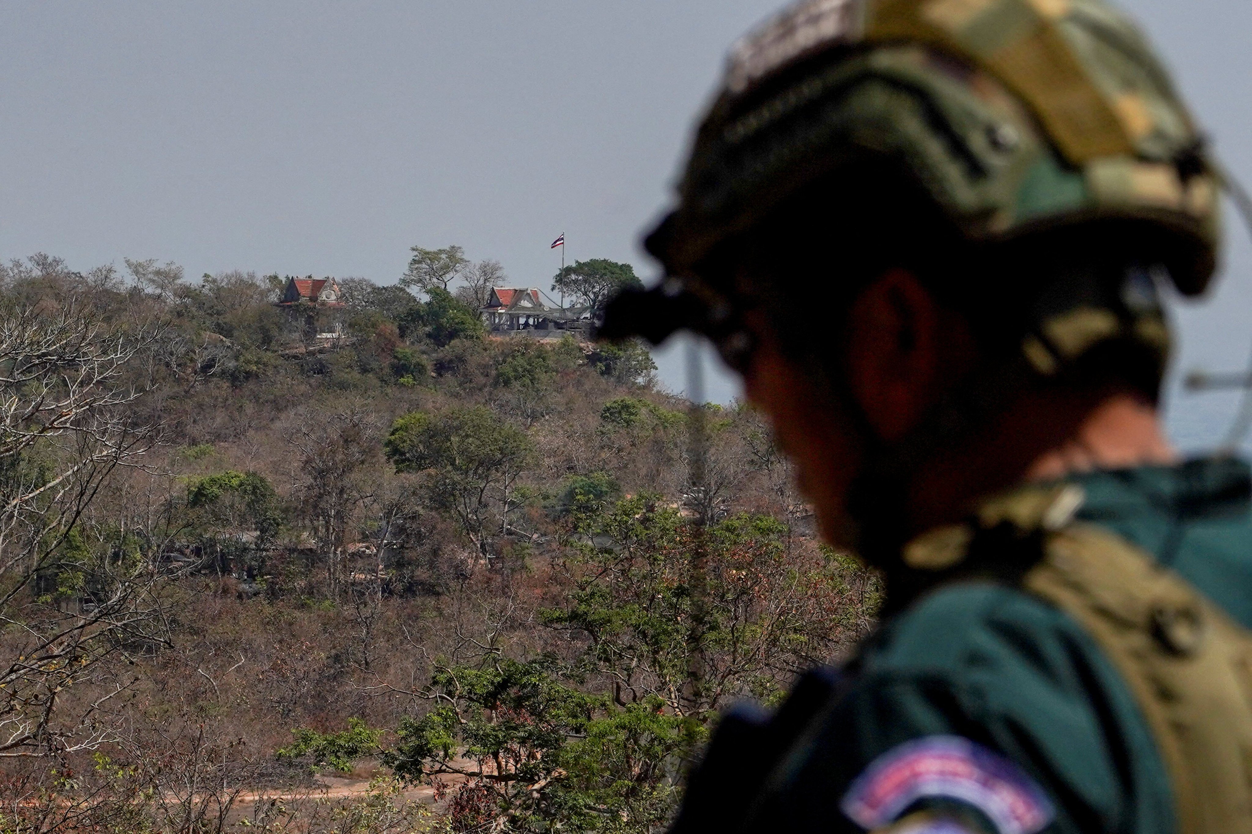 Thailand’s national flag flutters on a hillside in northeastern Sisaket province, as viewed from Cambodia’s Preah Vihear province on February 12. Photo: Reuters