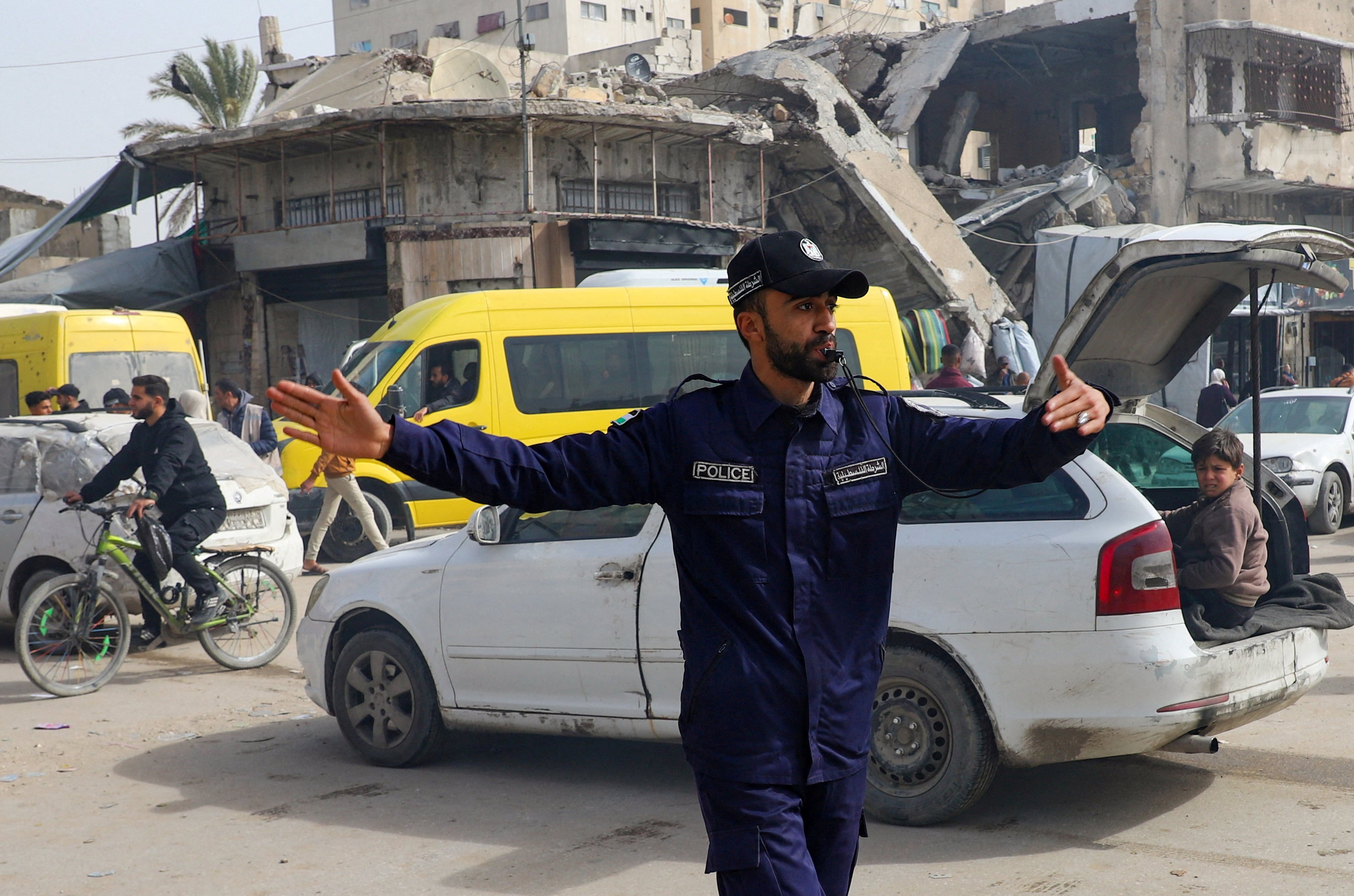 A Hamas police officer directs traffic in Gaza City on January 28. Photo: Reuters