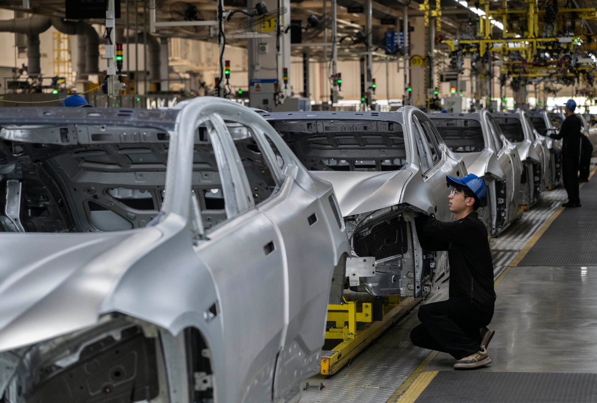 A worker checks the frame of a car on a production line under Geely Auto’s Zeekr brand in Ningbo. Chinese brands like Geely have gone global, but they are almost non-existent in the US. Photo: Getty Images A worker checks the frame of a car on a production line under Geely Auto’s Zeekr brand in Ningbo. Chinese brands like Geely have gone global, but they are almost non-existent in the US. Photo: Getty Images