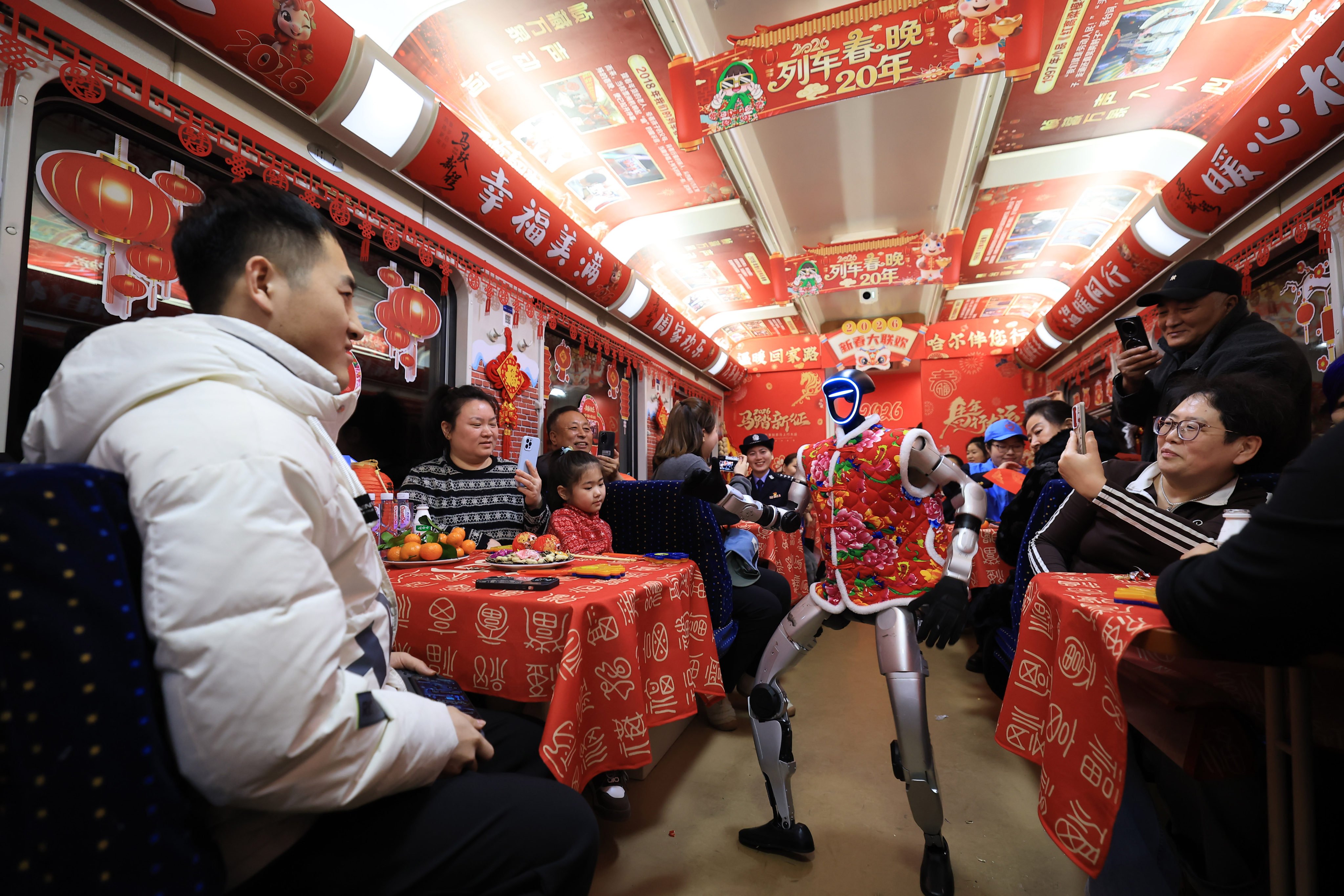 Robots dance for the Spring Festival Gala on train travelling from Qiqihar, Heilongjiang province, to Beijing on February 13. Photo: Xinhua