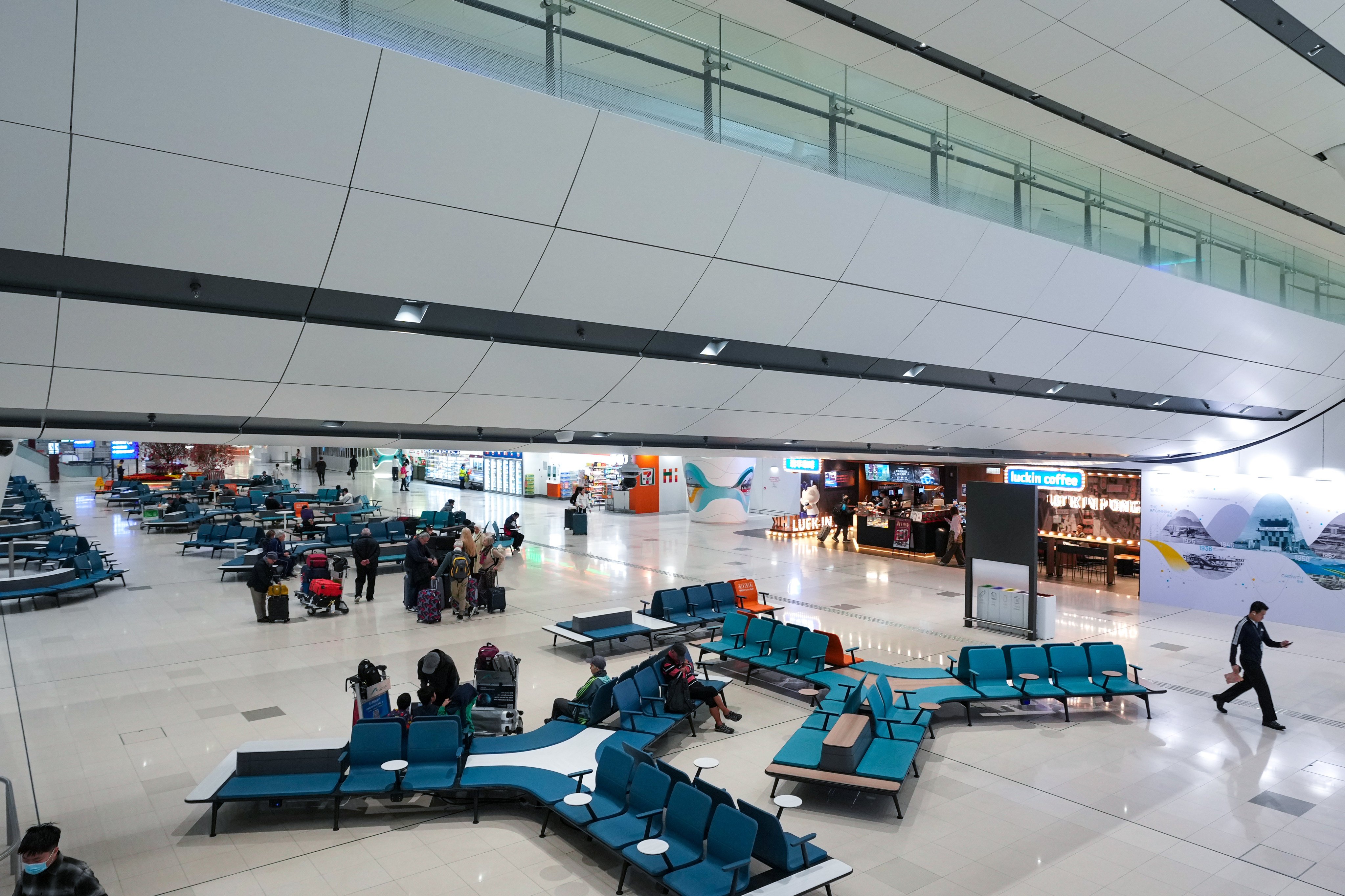 On February 17, people walk through Hong Kong International Airport’s second terminal, which will be officially opened in late May. Photo: Sam Tsang