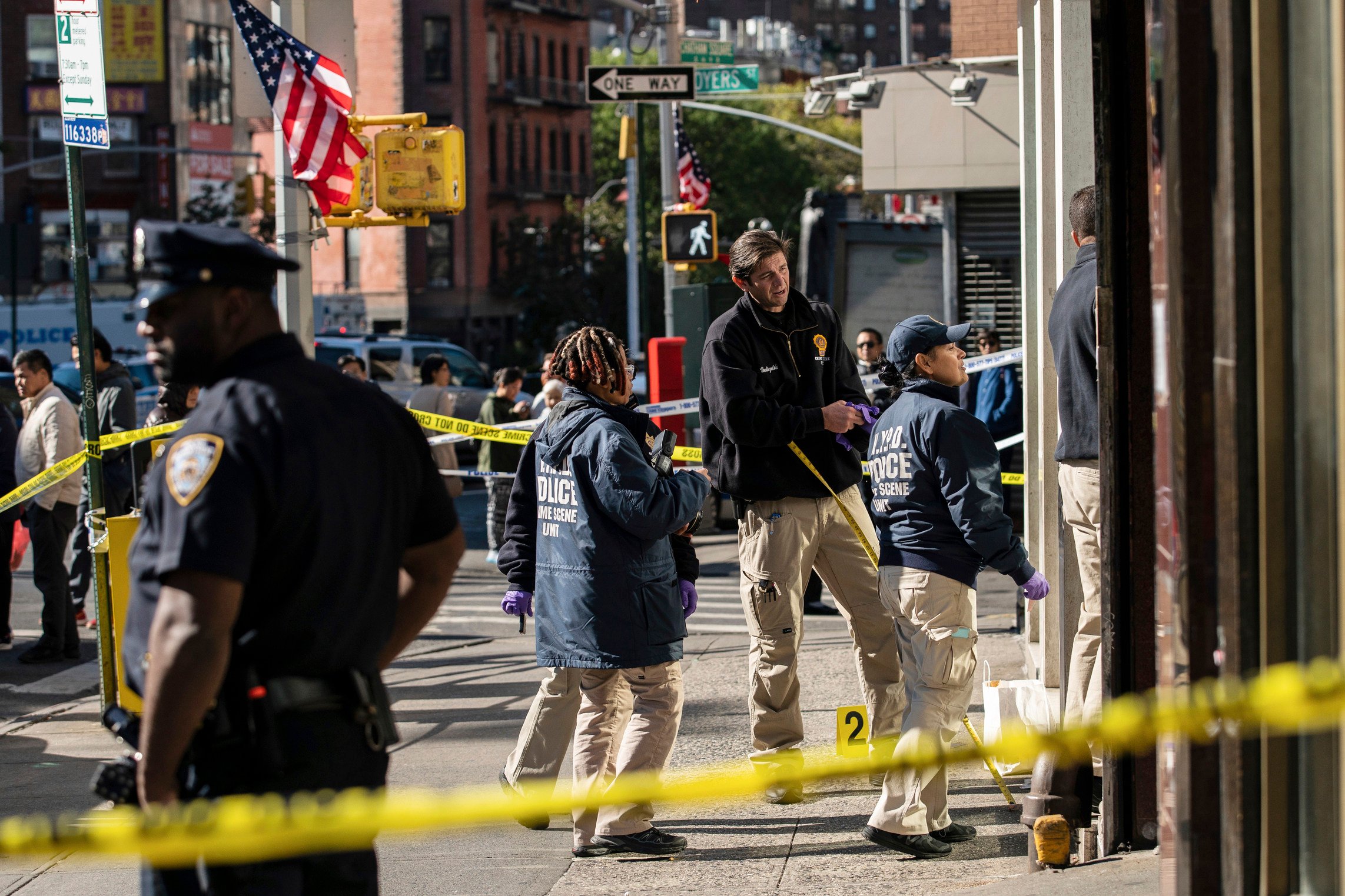 Police investigate the scene of an attack in New York’s Chinatown in October 2019. Photo: AP