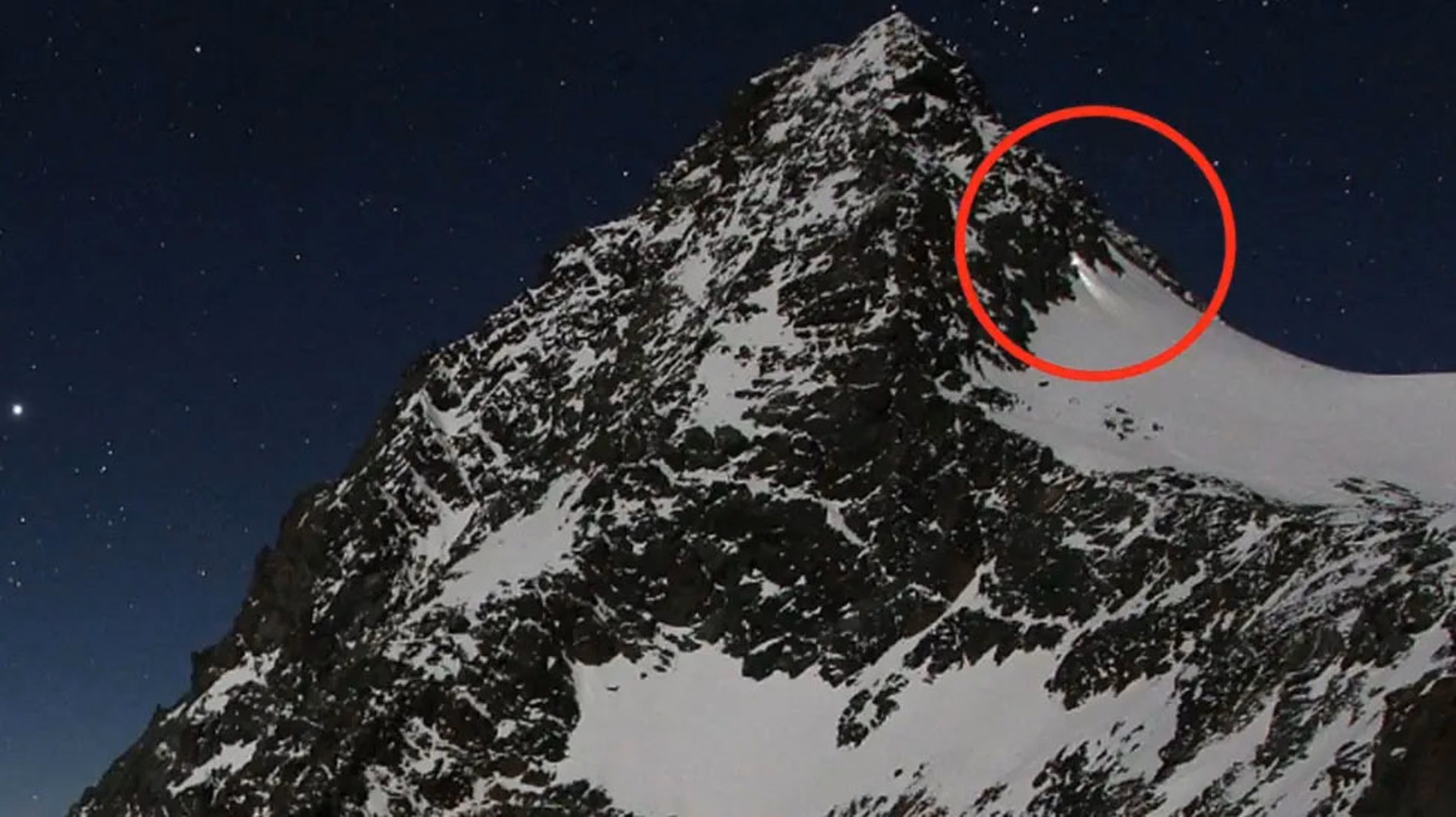 A webcam image shows Thomas P. descending Grossglockner mountain with a flashlight. Photo: www.foto-webcam.eu