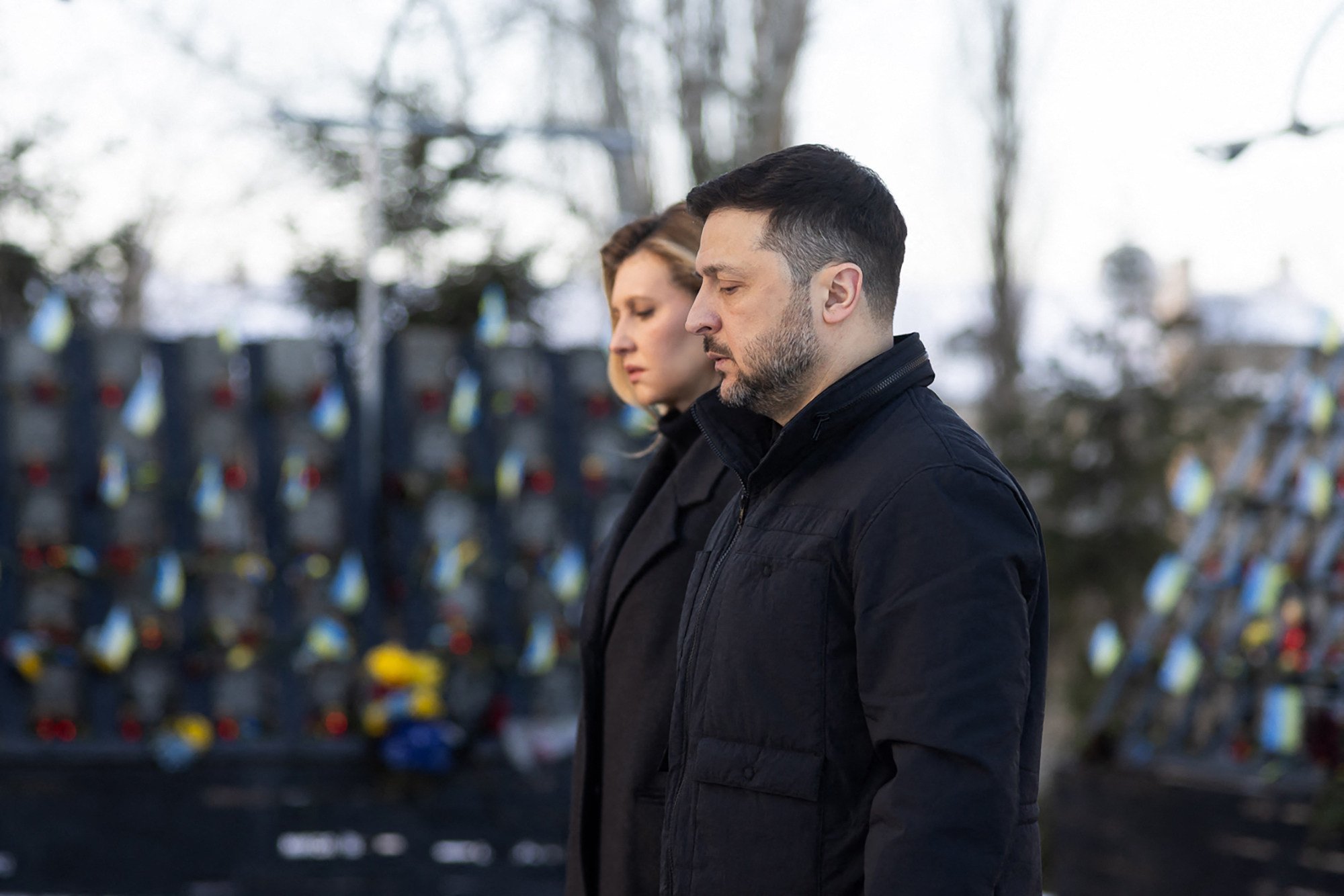 Ukraine’s President Volodymyr Zelensky and First Lady Olena Zelenska pay tribute to those killed during the Euromaidan protests in 2014 in Kyiv on Friday. Photo: Ukrainian Presidential Press Service / AFP